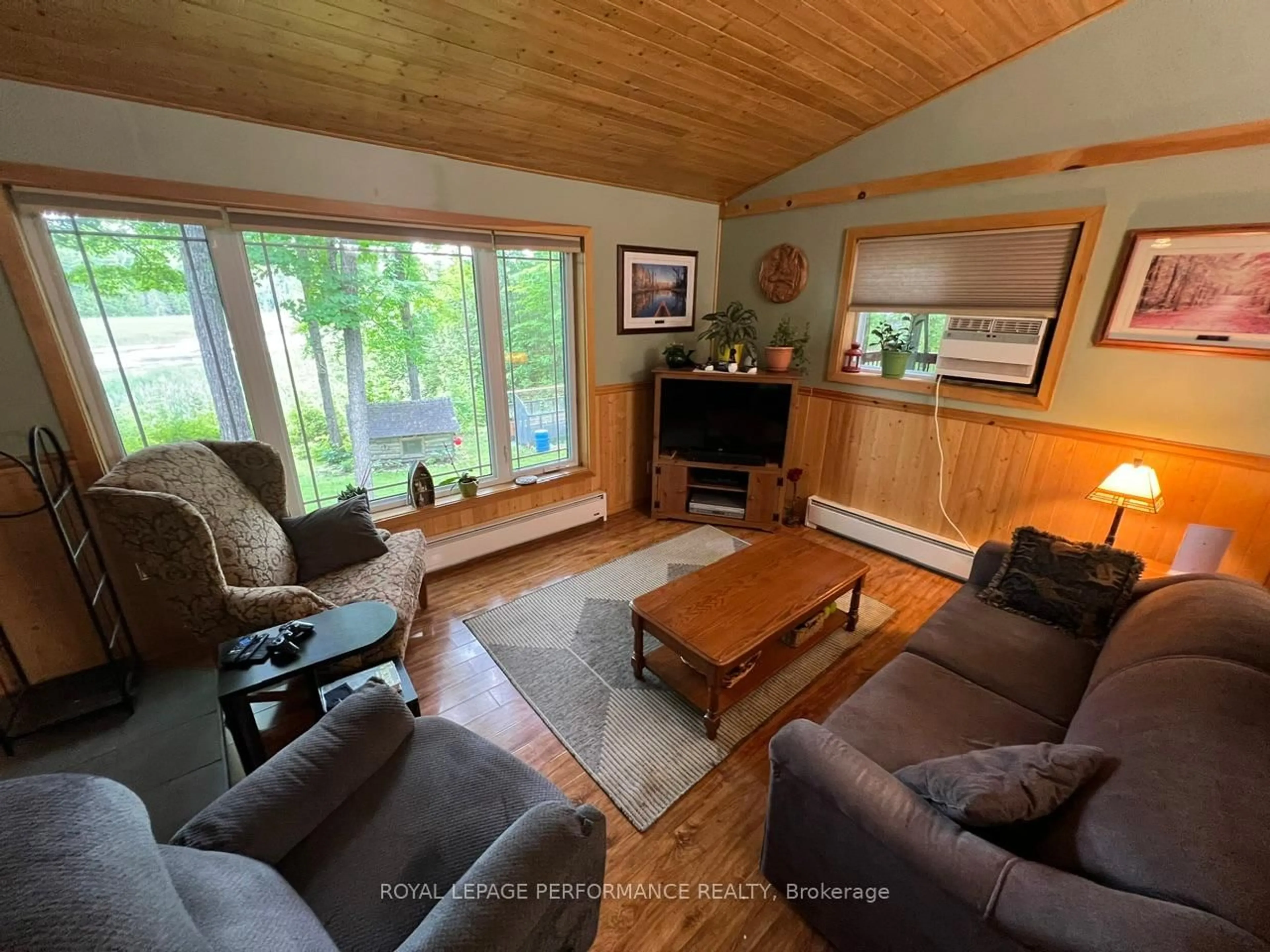 Living room with furniture, wood/laminate floor for 253 LACOURSE Lane, White Lake Ontario K0A 3L0