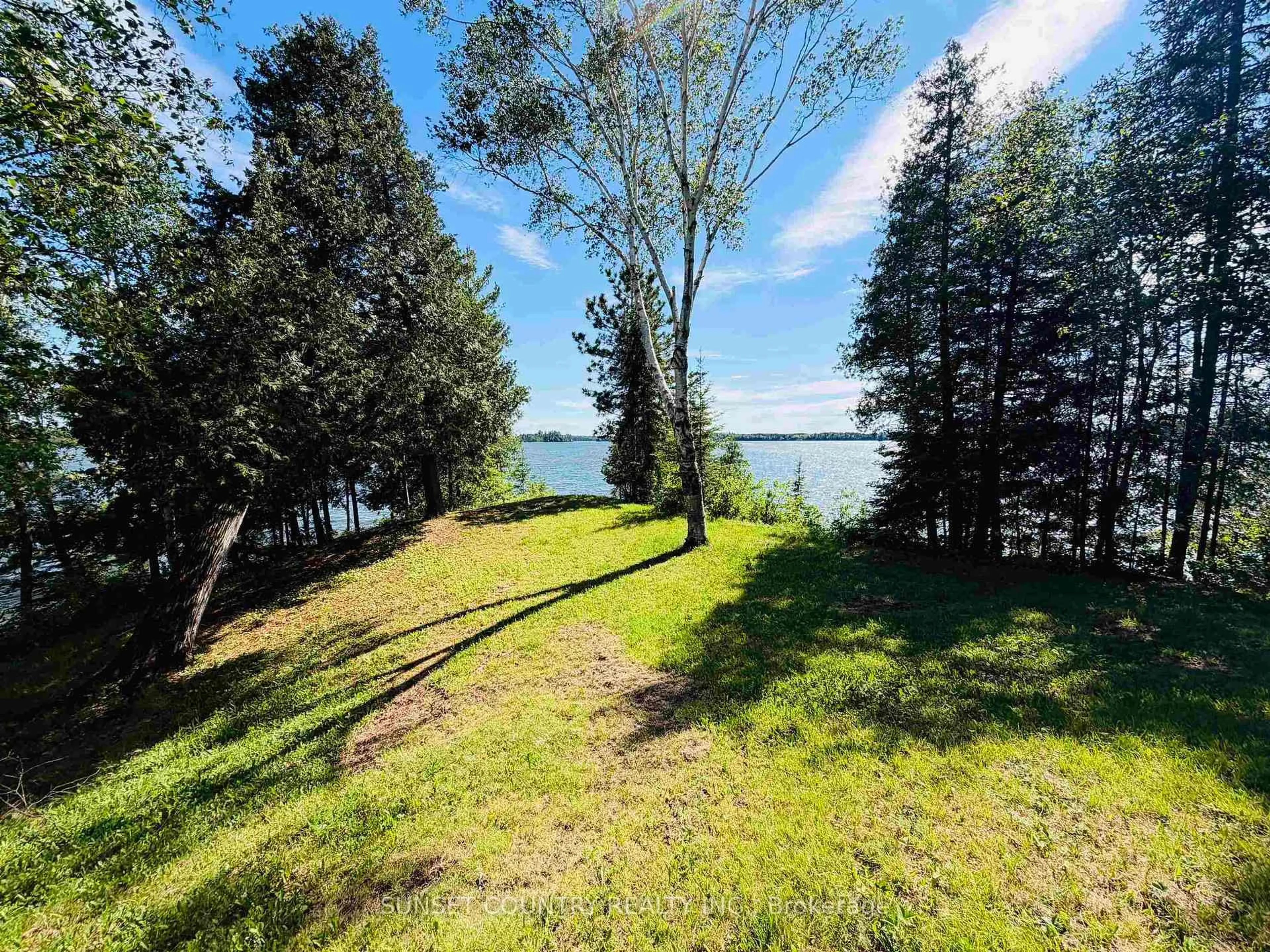A pic from outside/outdoor area/front of a property/back of a property/a pic from drone, water/lake/river/ocean view for 108 Dawatts Rd, Machin Ontario P0V 1S0