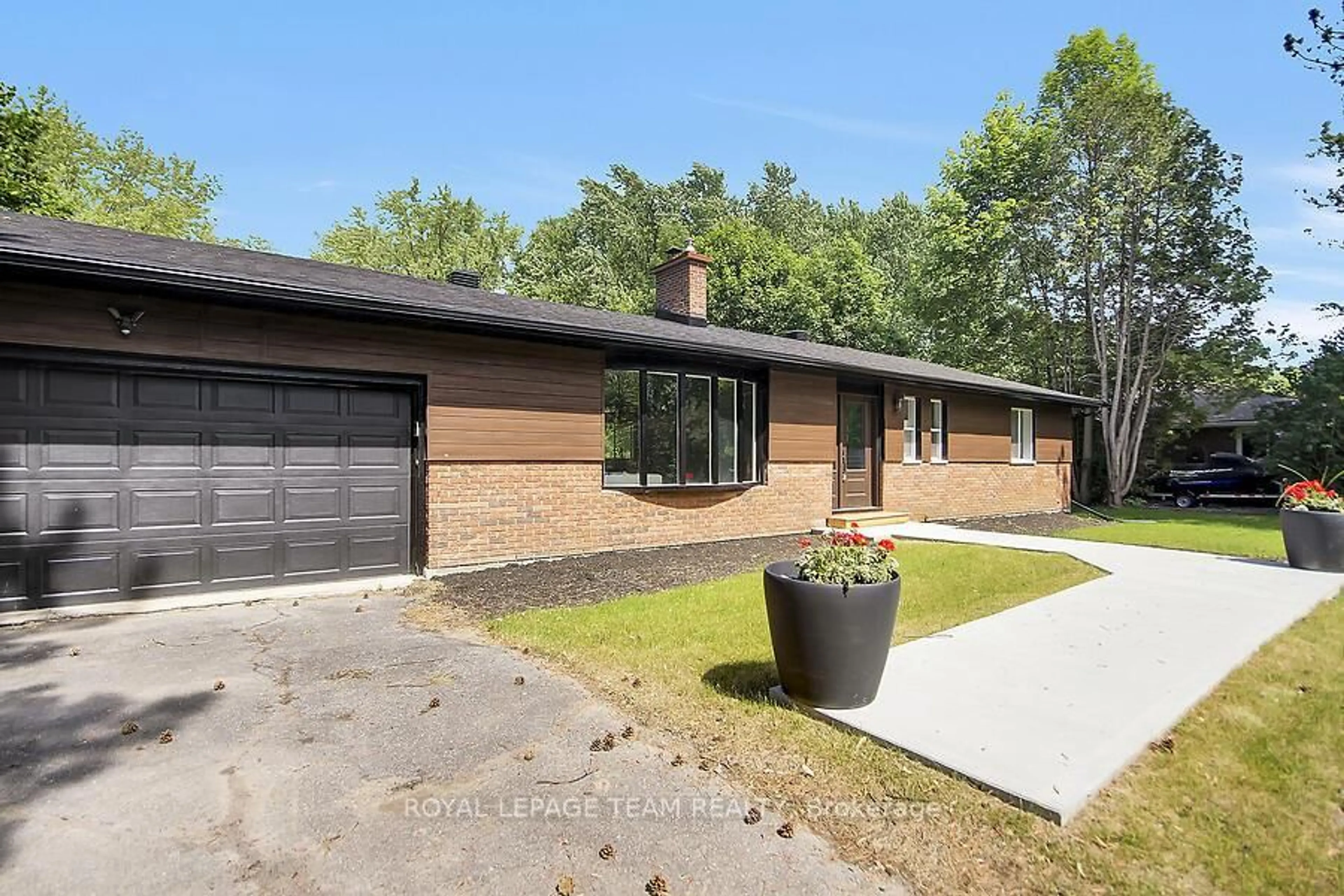 Home with brick exterior material, street for 6636 MARINA Dr, Manotick Ontario K4M 1B3