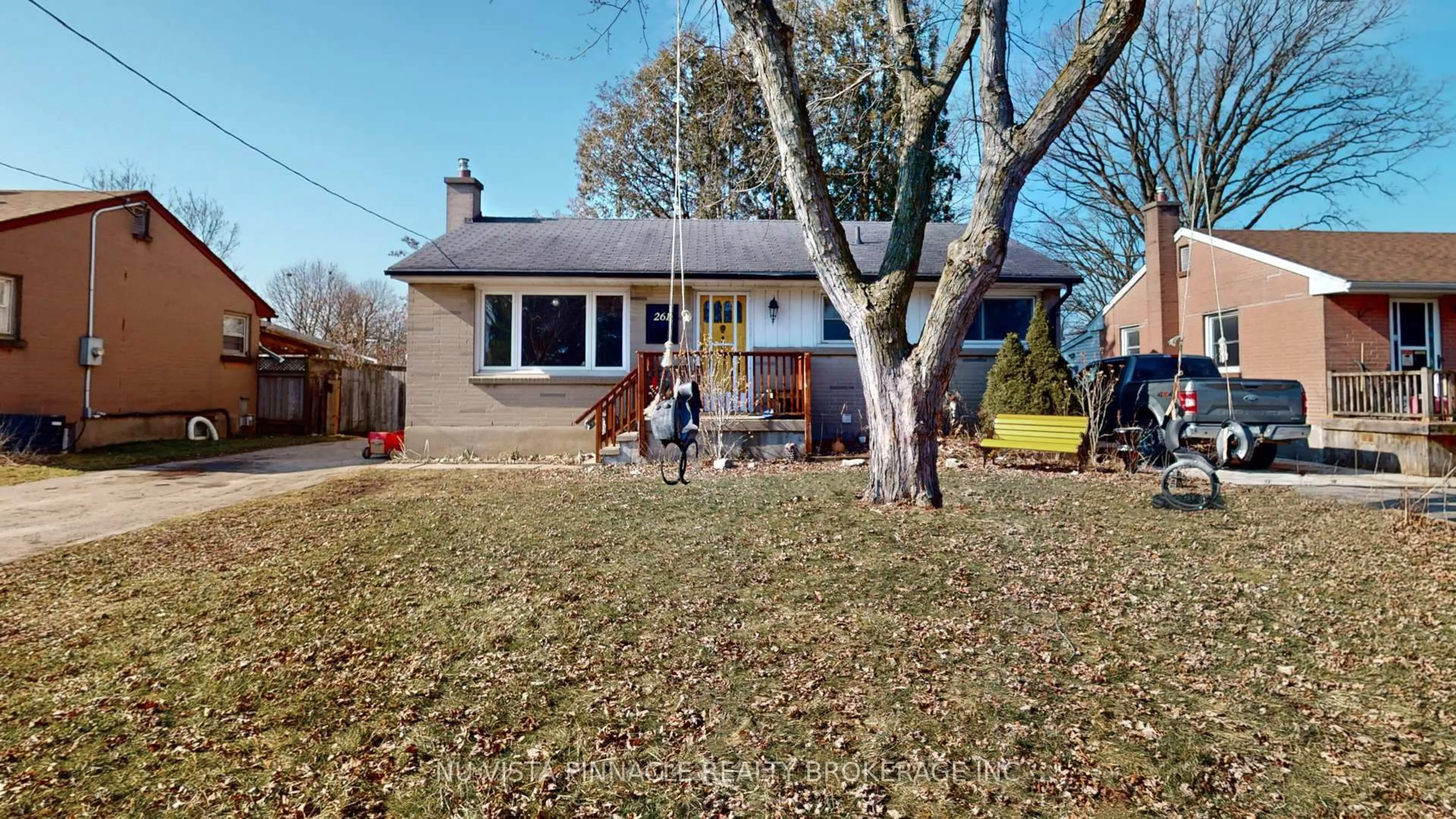 A pic from outside/outdoor area/front of a property/back of a property/a pic from drone, street for 261 Winnipeg St, London East Ontario N5W 4T8