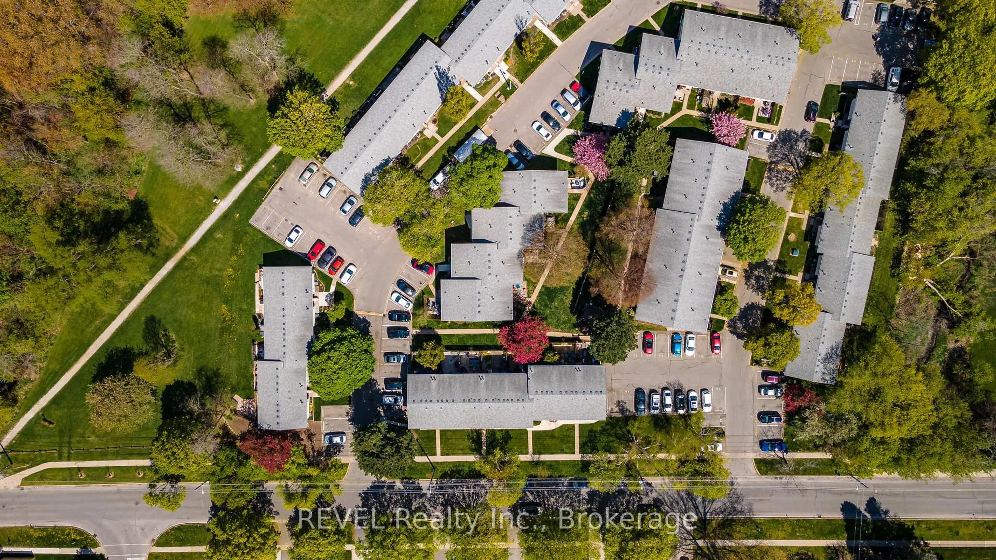 A pic from outside/outdoor area/front of a property/back of a property/a pic from drone, street for 151 Parnell Rd #56, St. Catharines Ontario L2M 3S4