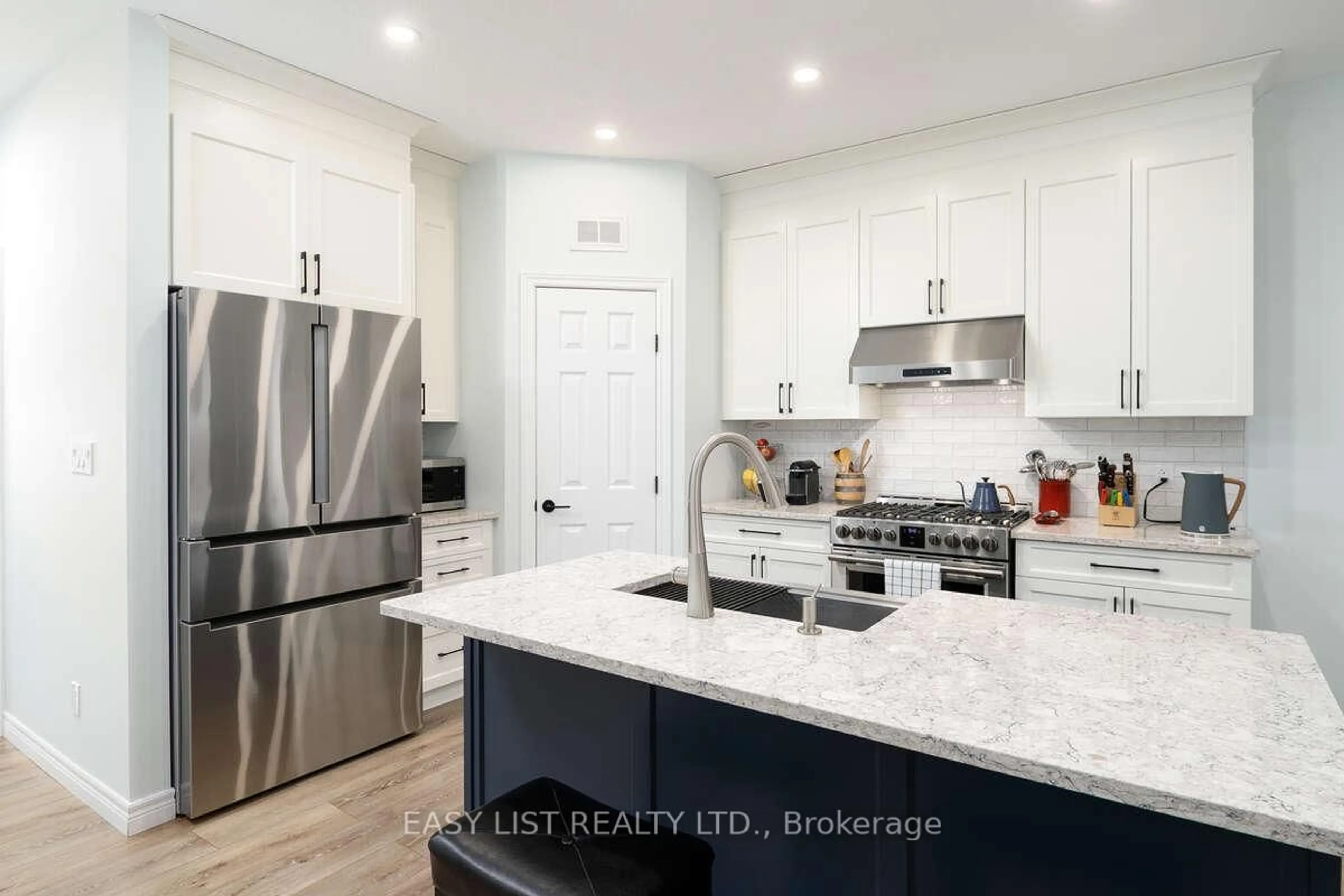 Open concept kitchen, ceramic/tile floor for 18 Dayton Crt, Prince Edward County Ontario K0K 2T0