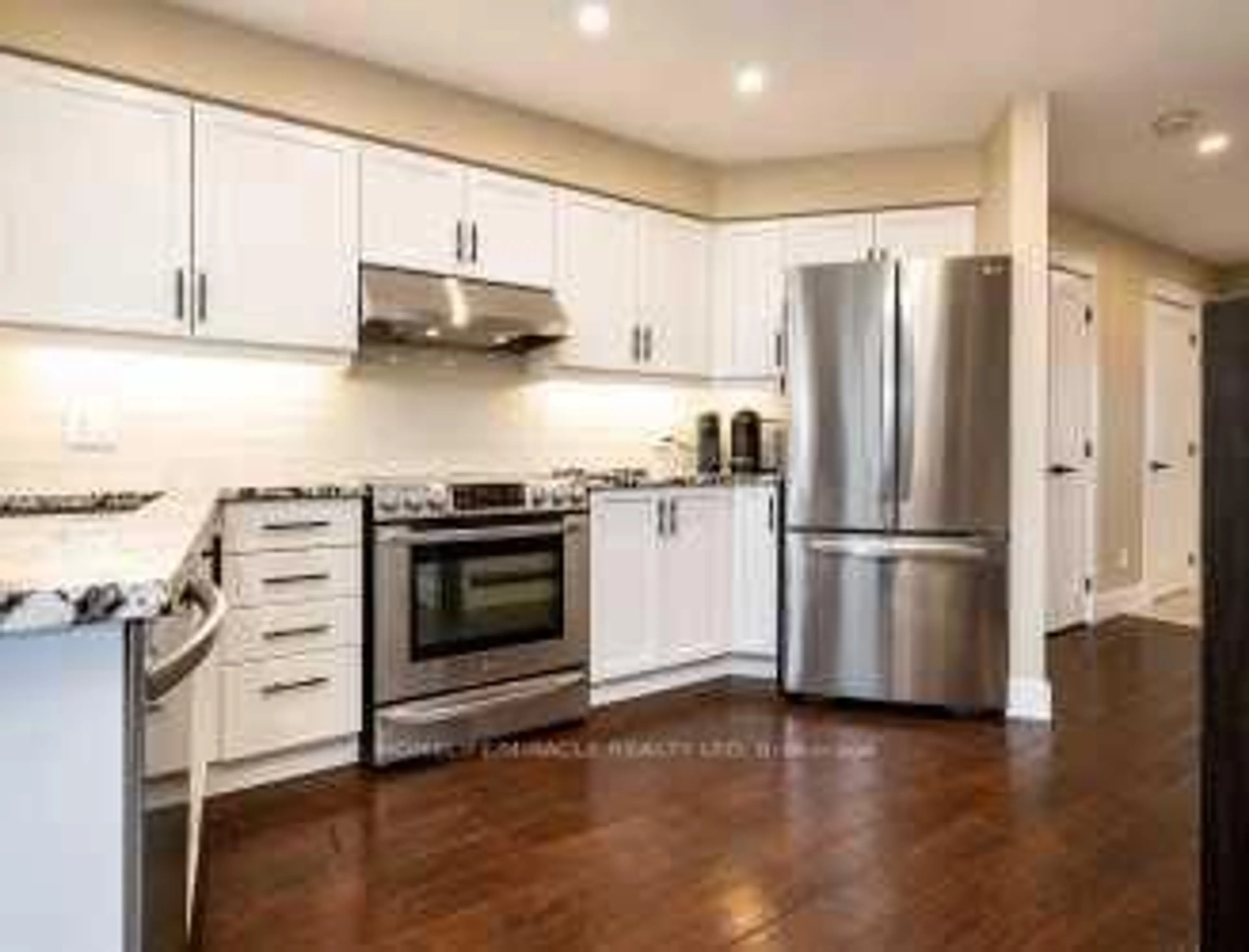 Open concept kitchen, wood/laminate floor for 11 Reistview St, Kitchener Ontario N2E 4H1