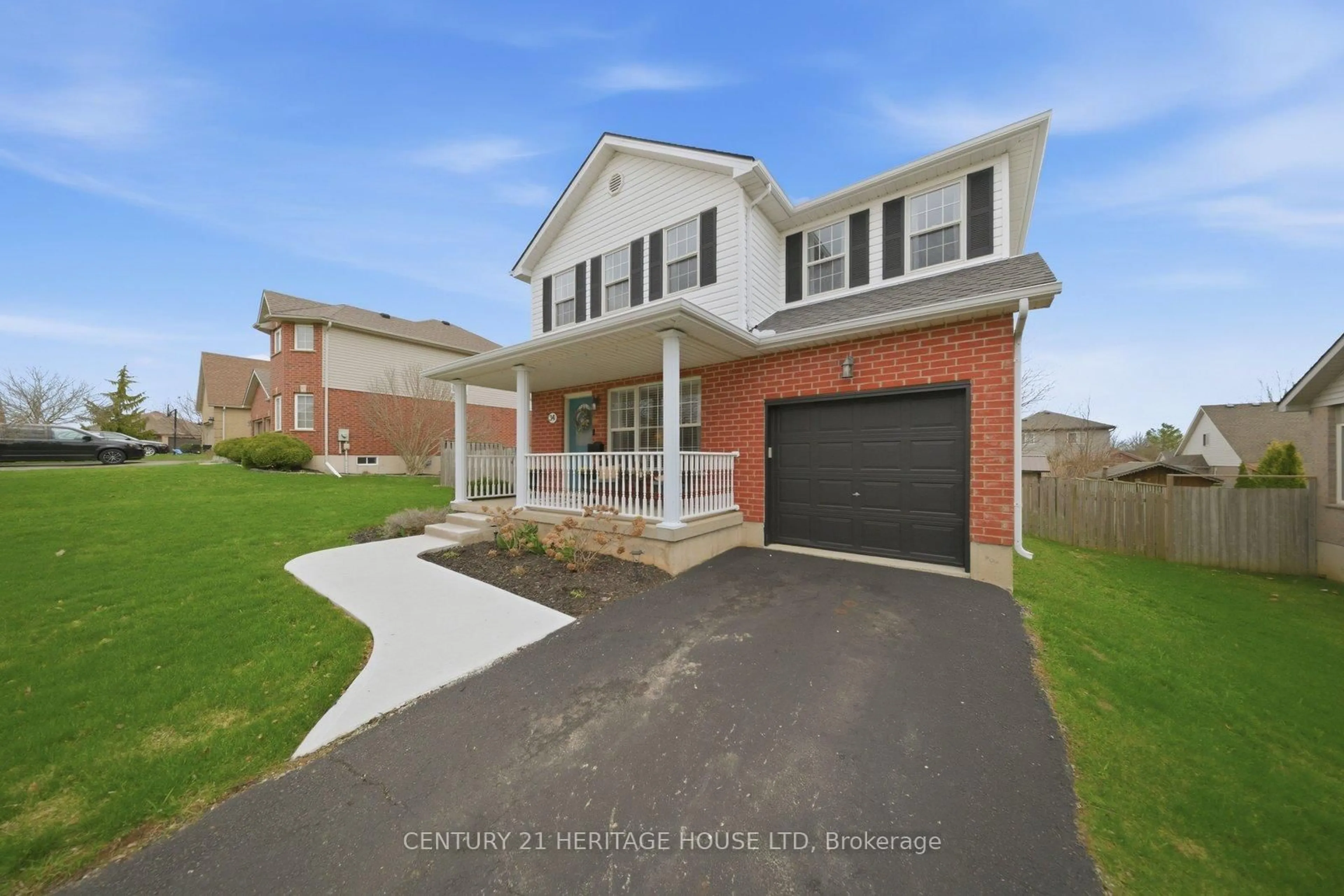 Home with brick exterior material, street for 34 Primrose Dr, Tillsonburg Ontario N4G 5S7