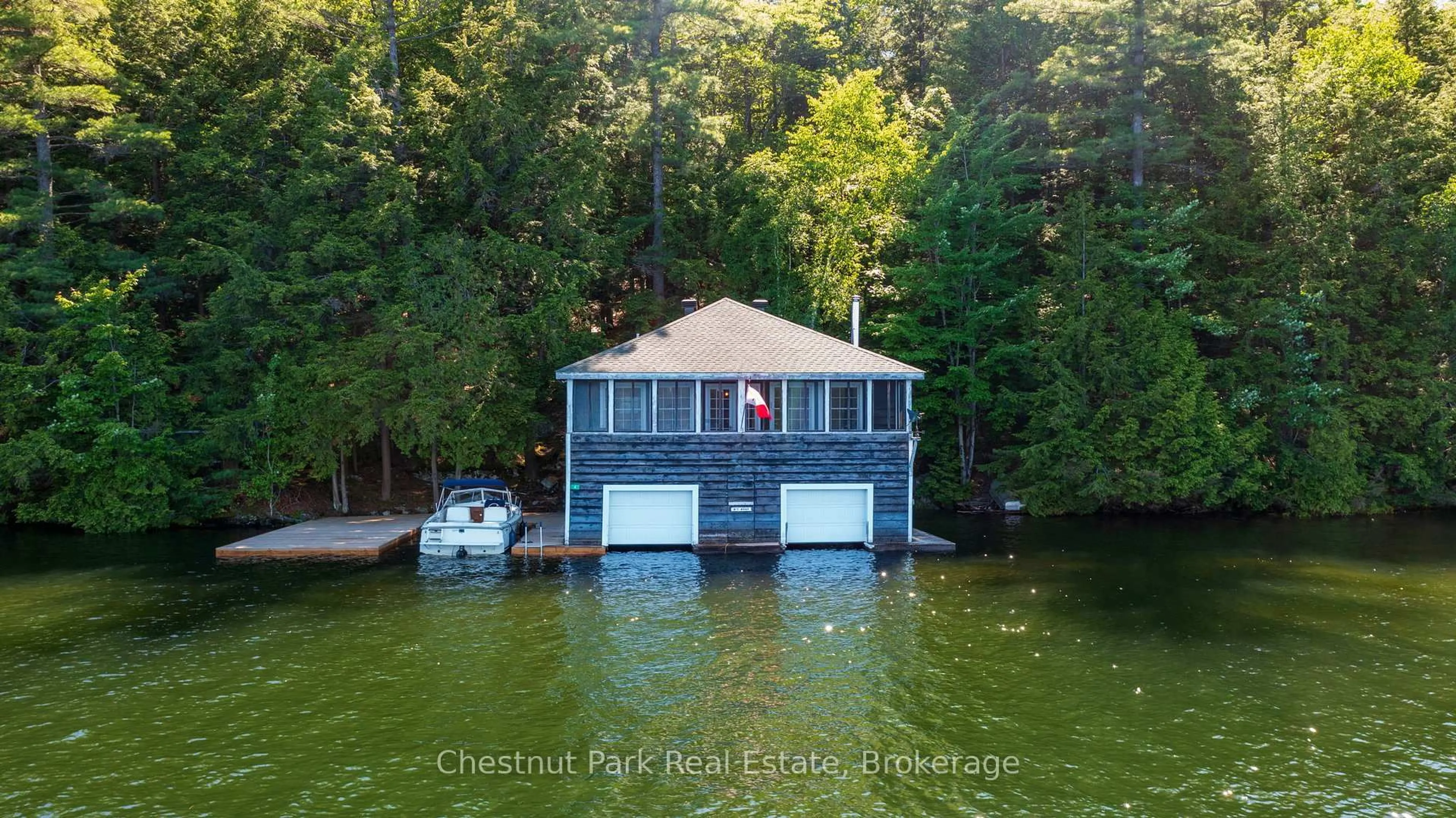 A pic from outside/outdoor area/front of a property/back of a property/a pic from drone, water/lake/river/ocean view for 4 Playfair Island # 3, Seguin Ontario P0C 1H0