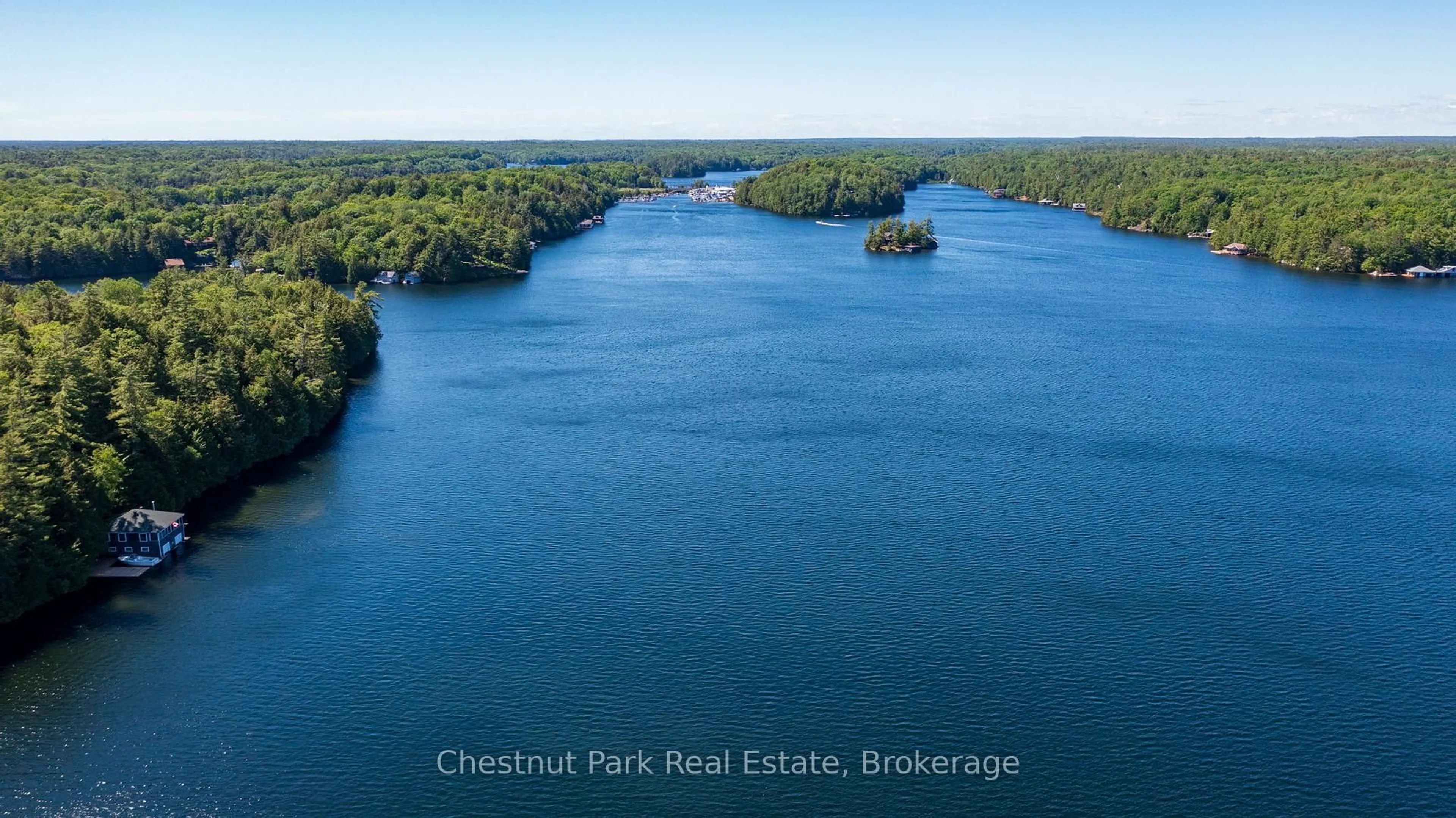 A pic from outside/outdoor area/front of a property/back of a property/a pic from drone, water/lake/river/ocean view for 4 Playfair Island # 3, Seguin Ontario P0C 1H0