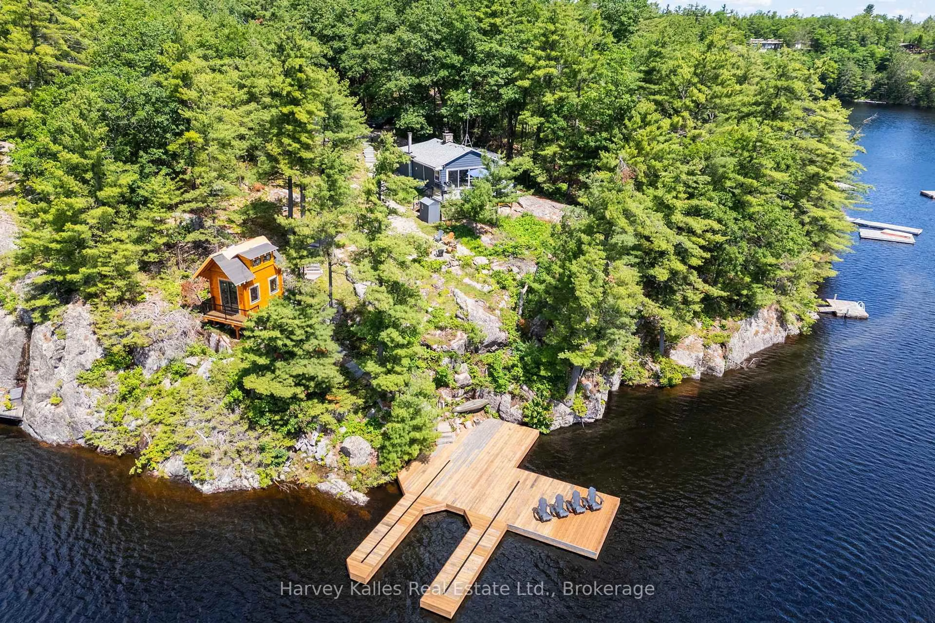 A pic from outside/outdoor area/front of a property/back of a property/a pic from drone, water/lake/river/ocean view for 1443 Silver Lake Rd, Gravenhurst Ontario P1P 0G3