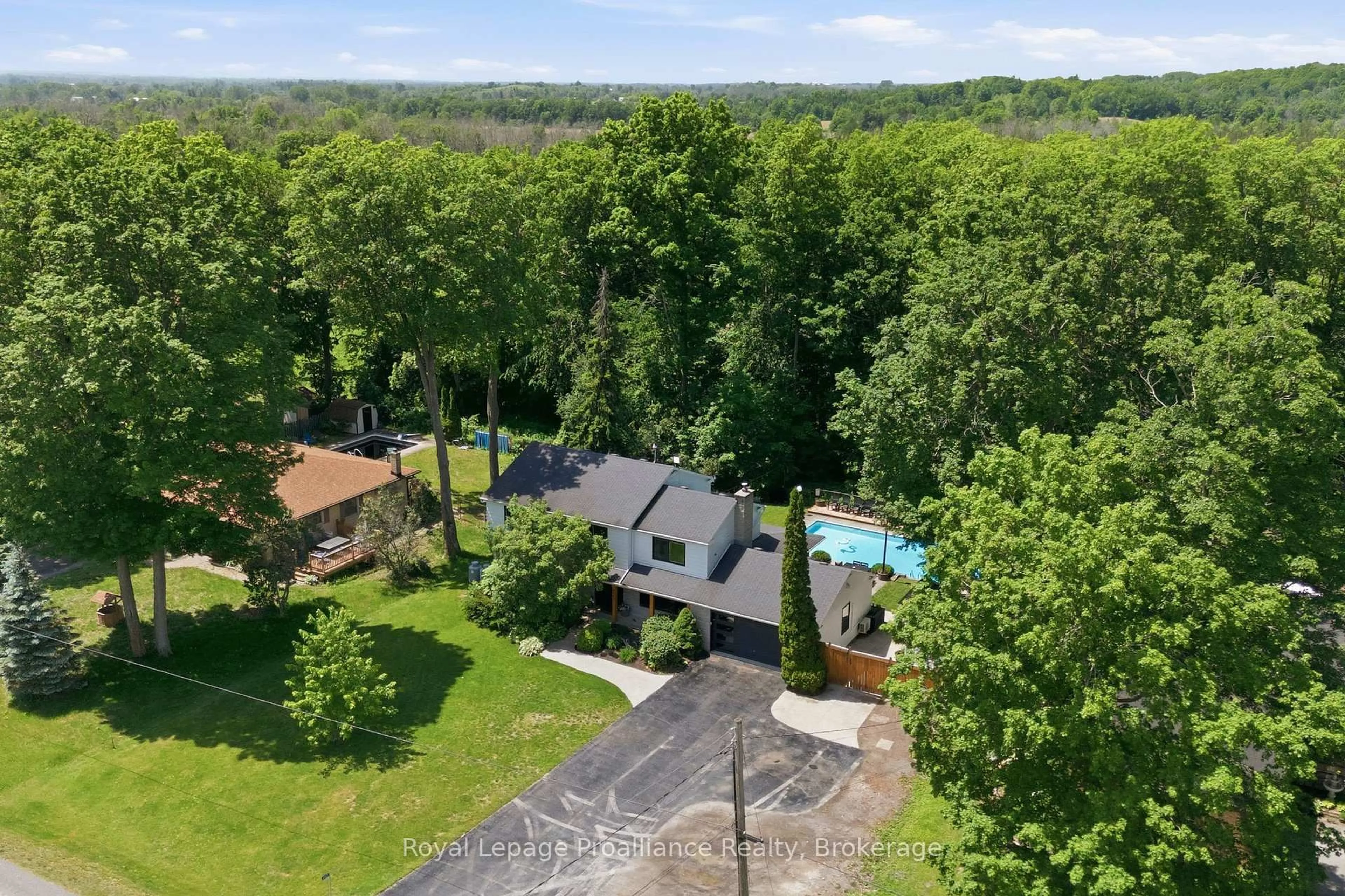 A pic from outside/outdoor area/front of a property/back of a property/a pic from drone, water/lake/river/ocean view for 1353 WALLBRIDGE LOYALIST Rd, Belleville Ontario K8N 4Z5