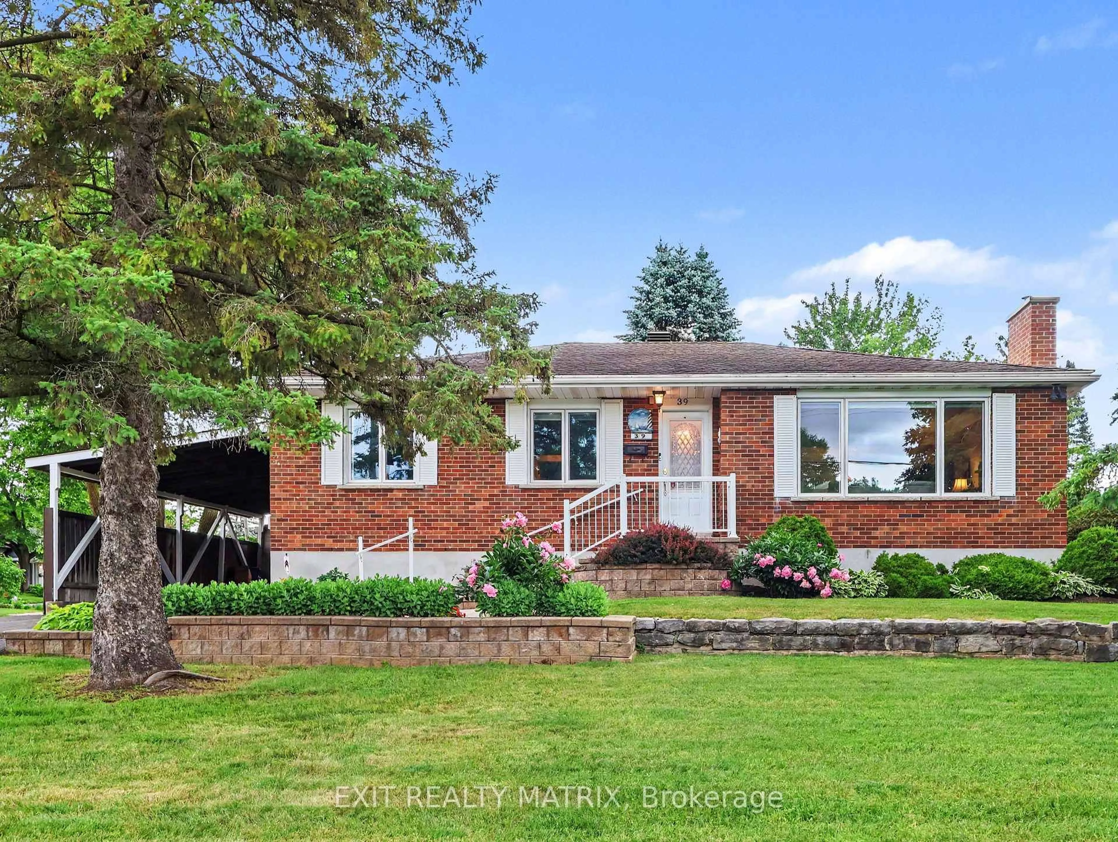 Home with brick exterior material, street for 39 Tauvette St, Ottawa Ontario K1B 3A1