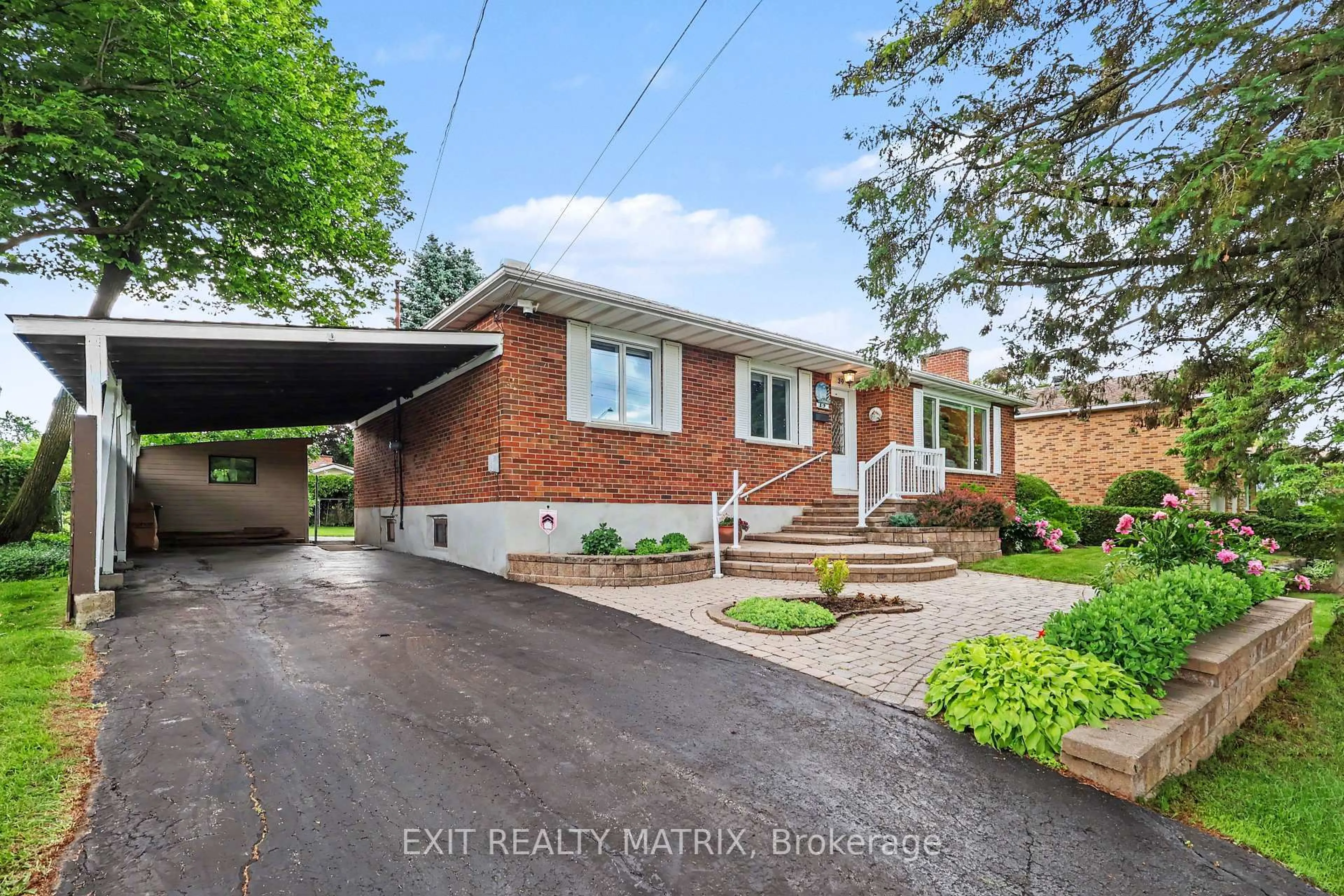 Home with brick exterior material, street for 39 Tauvette St, Ottawa Ontario K1B 3A1