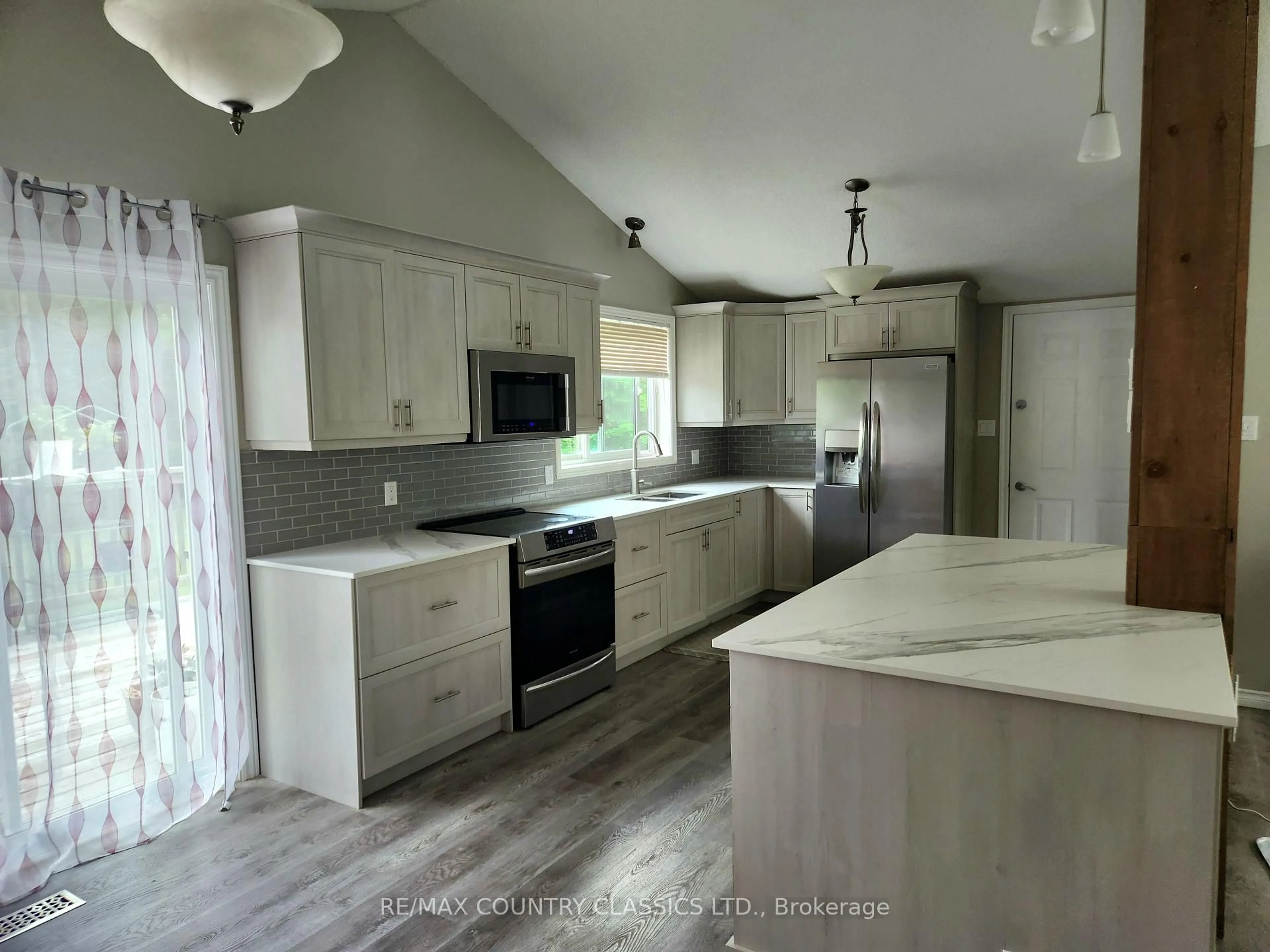 Open concept kitchen, ceramic/tile floor for 1930 Weslemkoon Lk Rd, Hastings Ontario K0L 1W0