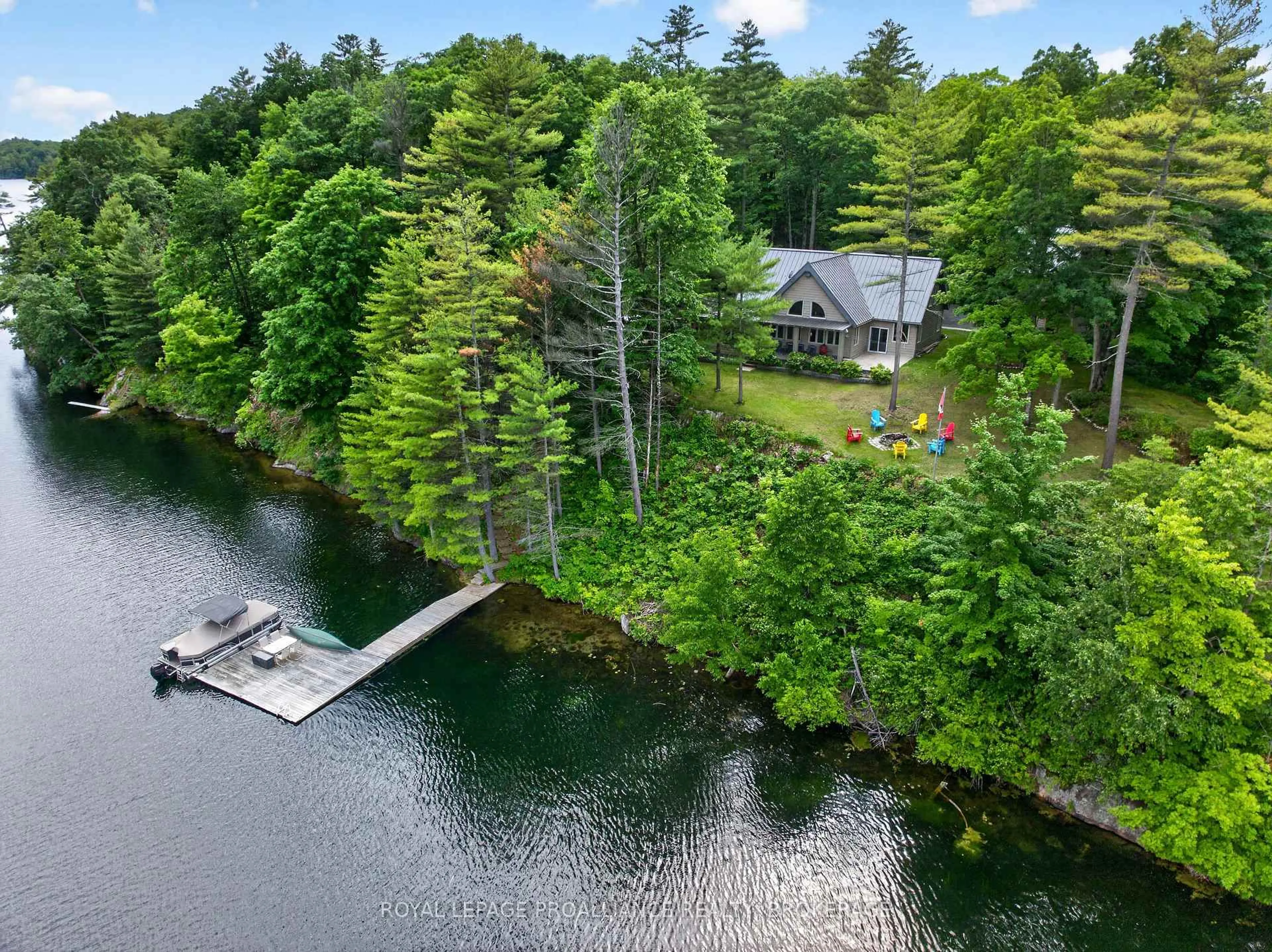 A pic from outside/outdoor area/front of a property/back of a property/a pic from drone, water/lake/river/ocean view for 116 Nuthatch Lane, Rideau Lakes Ontario K0G 1E0