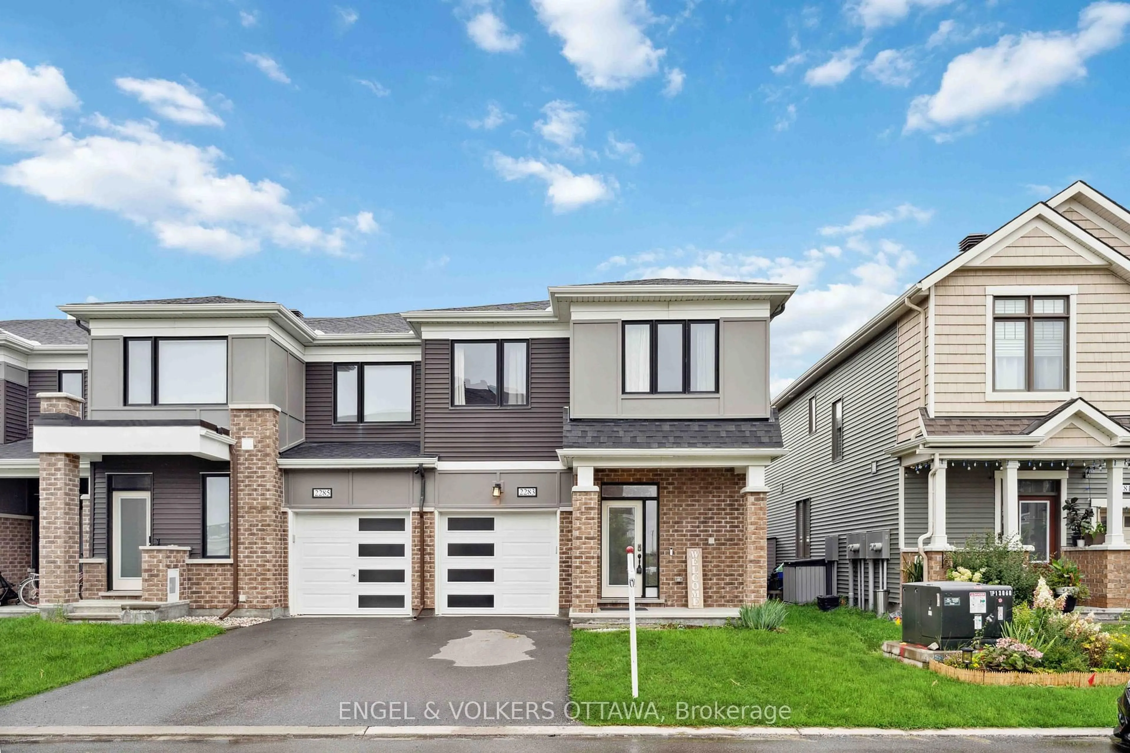 Home with brick exterior material, street for 2283 Watercolours Way, Ottawa Ontario K2J 6N2