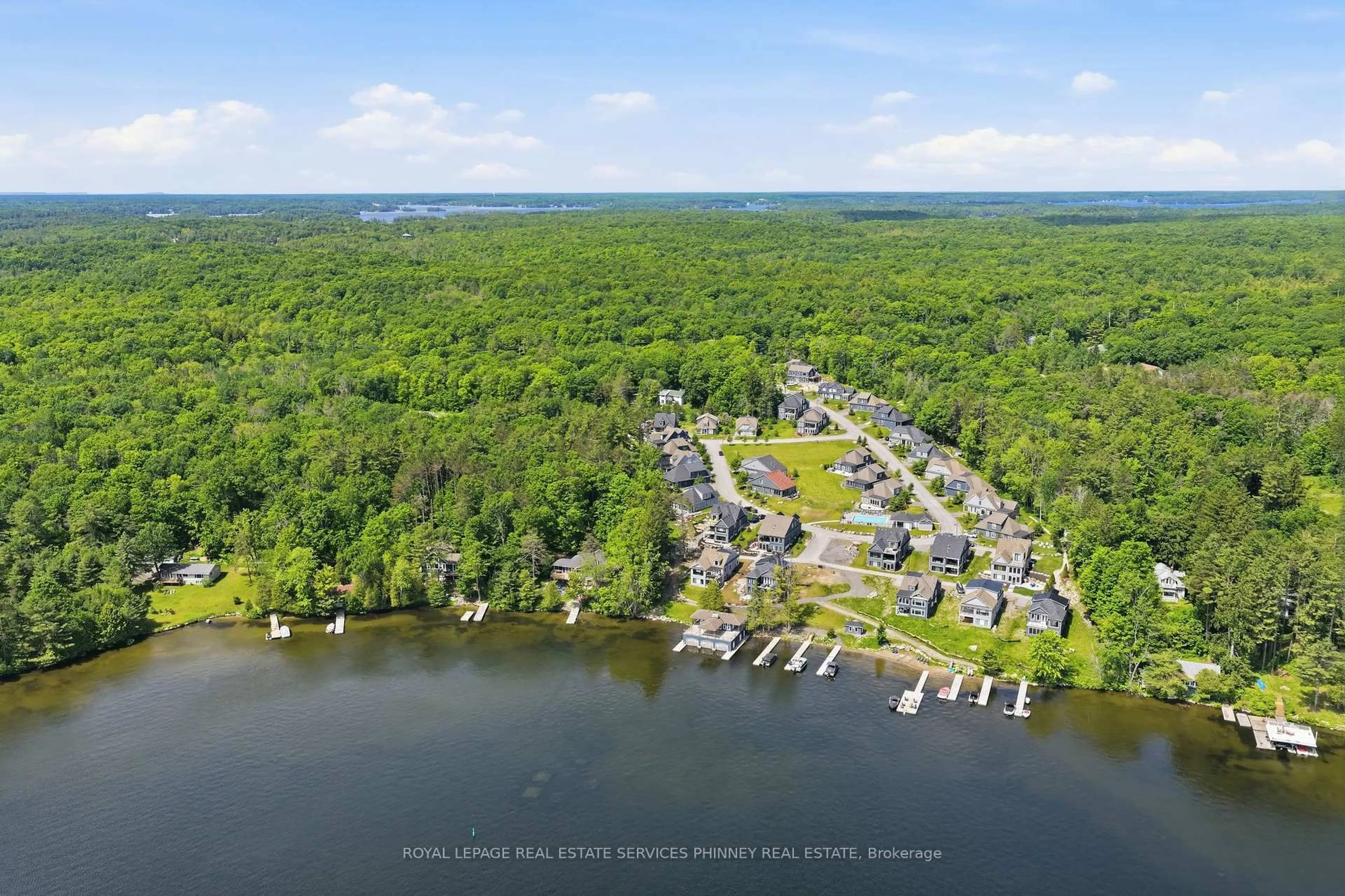 A pic from outside/outdoor area/front of a property/back of a property/a pic from drone, water/lake/river/ocean view for 2054 Peninsula Rd #43, Muskoka Lakes Ontario P0B 1G0