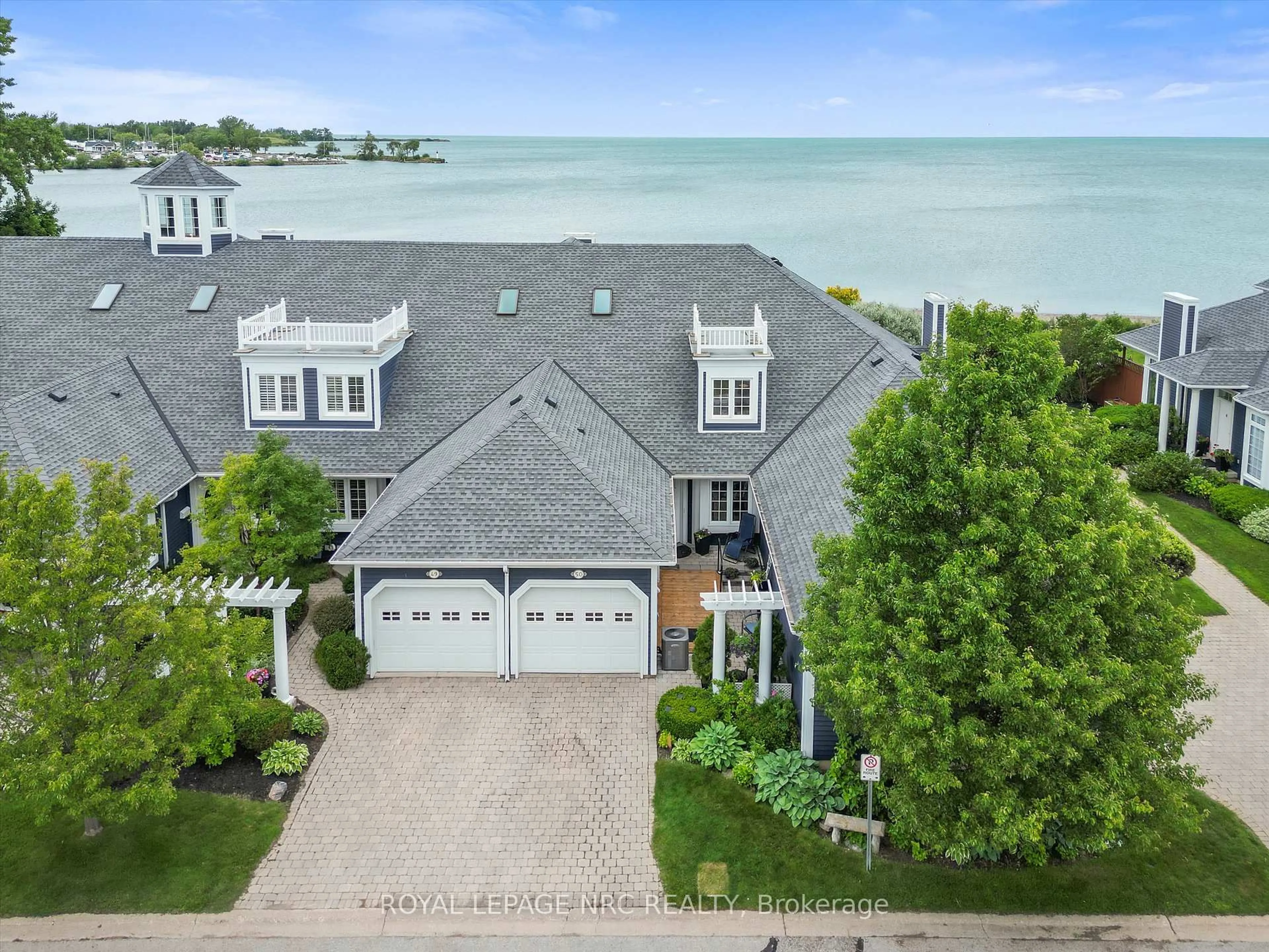 A pic from outside/outdoor area/front of a property/back of a property/a pic from drone, water/lake/river/ocean view for 11 Lakeside Dr #50, St. Catharines Ontario L2M 1P3