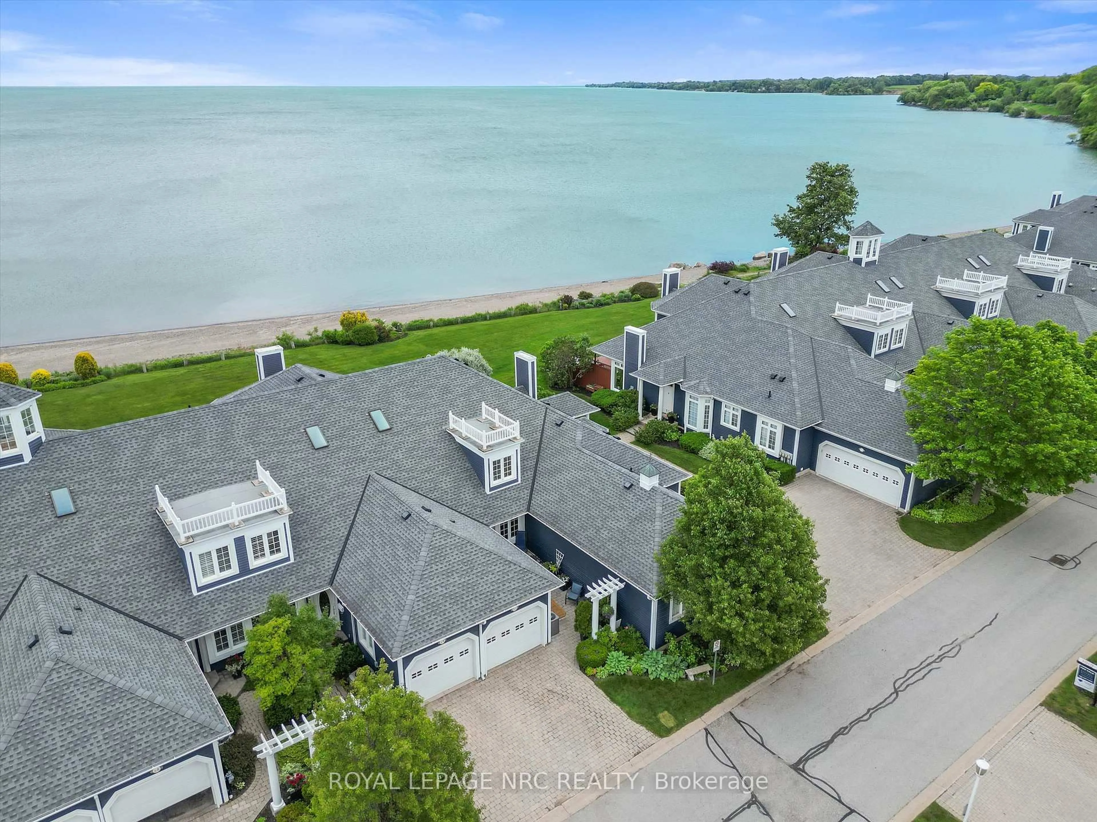 A pic from outside/outdoor area/front of a property/back of a property/a pic from drone, water/lake/river/ocean view for 11 Lakeside Dr #50, St. Catharines Ontario L2M 1P3