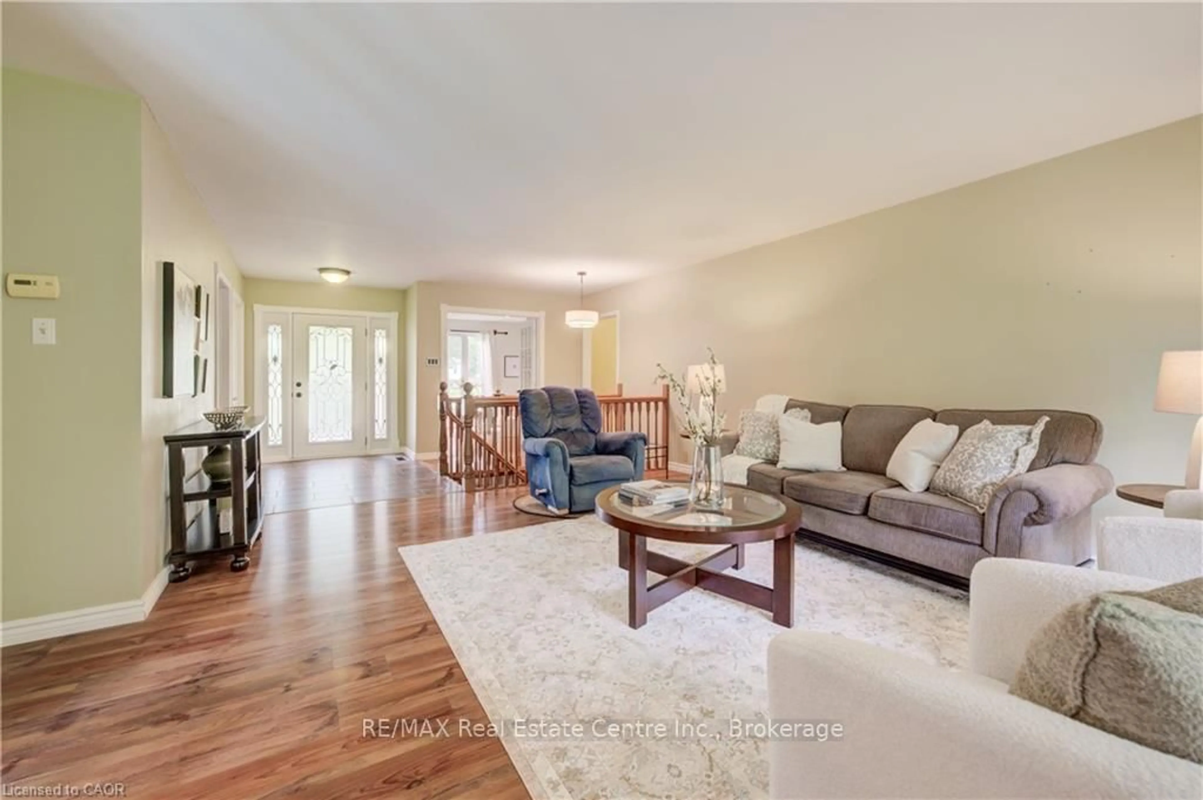 Living room with furniture, wood/laminate floor for 37 Aldergrange Ave, East Zorra-Tavistock Ontario N0J 1M0