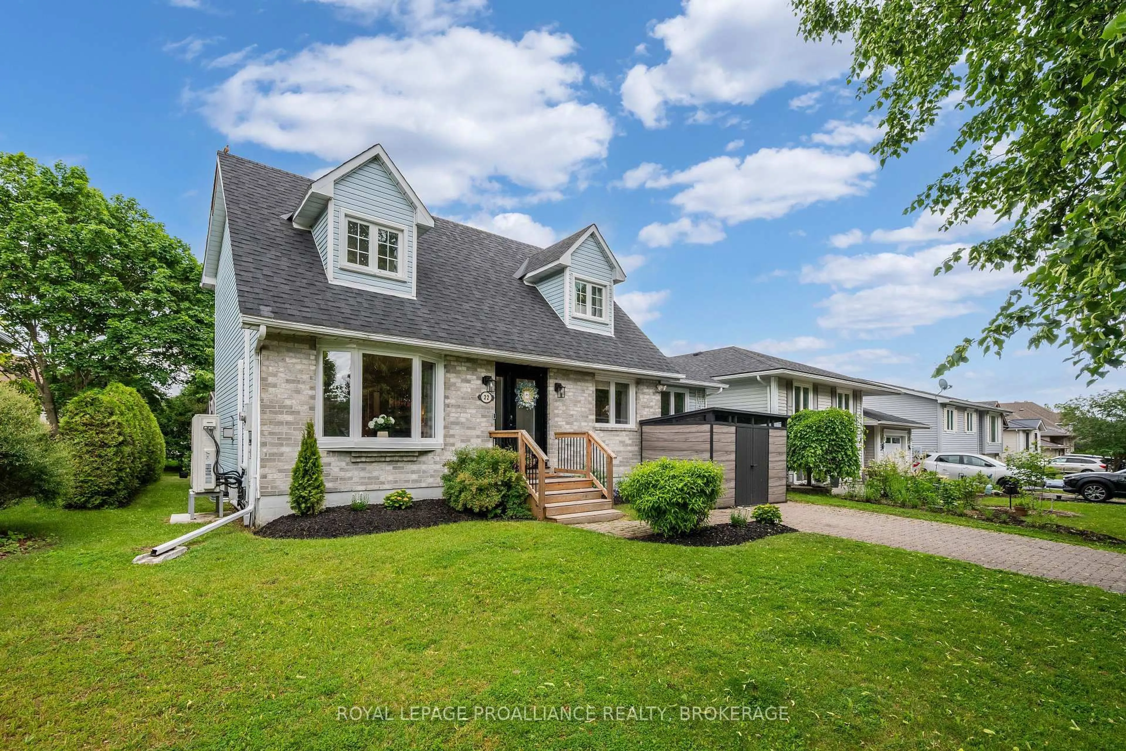 Home with vinyl exterior material, street for 22 Heritage Dr, Bath Ontario K0H 1G0