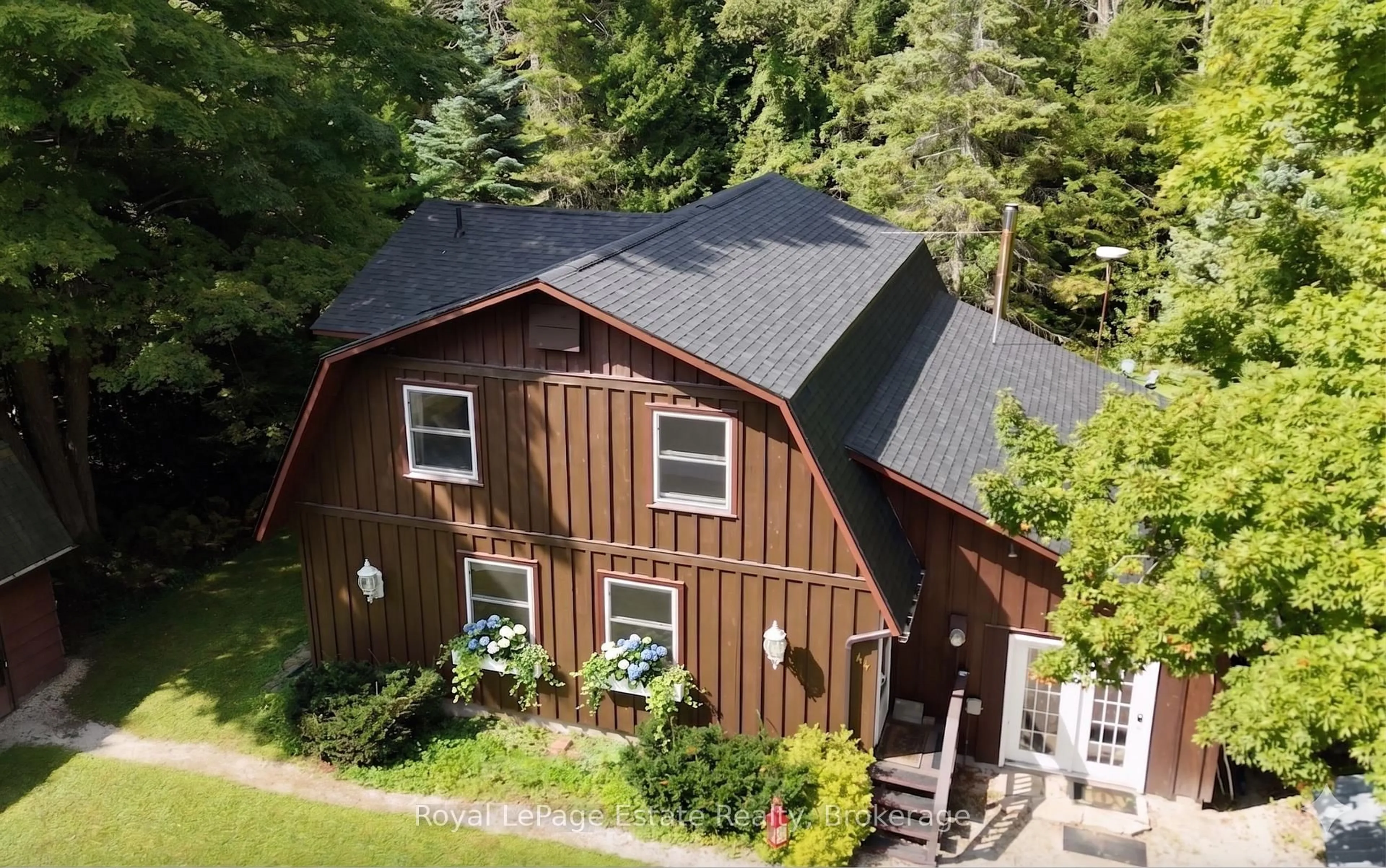 A pic from outside/outdoor area/front of a property/back of a property/a pic from drone, unknown for 44 Whitefish Blvd, South Bruce Peninsula Ontario N0H 2T0