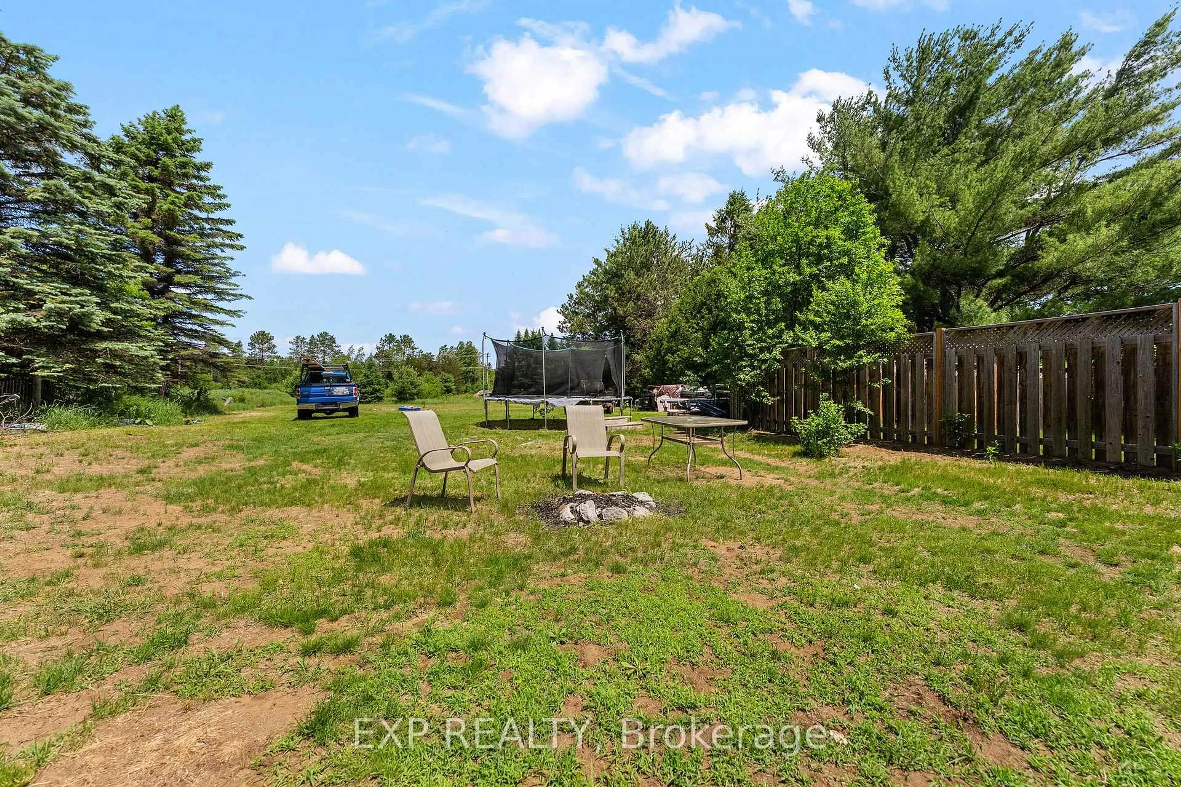 A pic from outside/outdoor area/front of a property/back of a property/a pic from drone, forest/trees view for 22 Lane St, Barry's Bay Ontario K0J 1B0