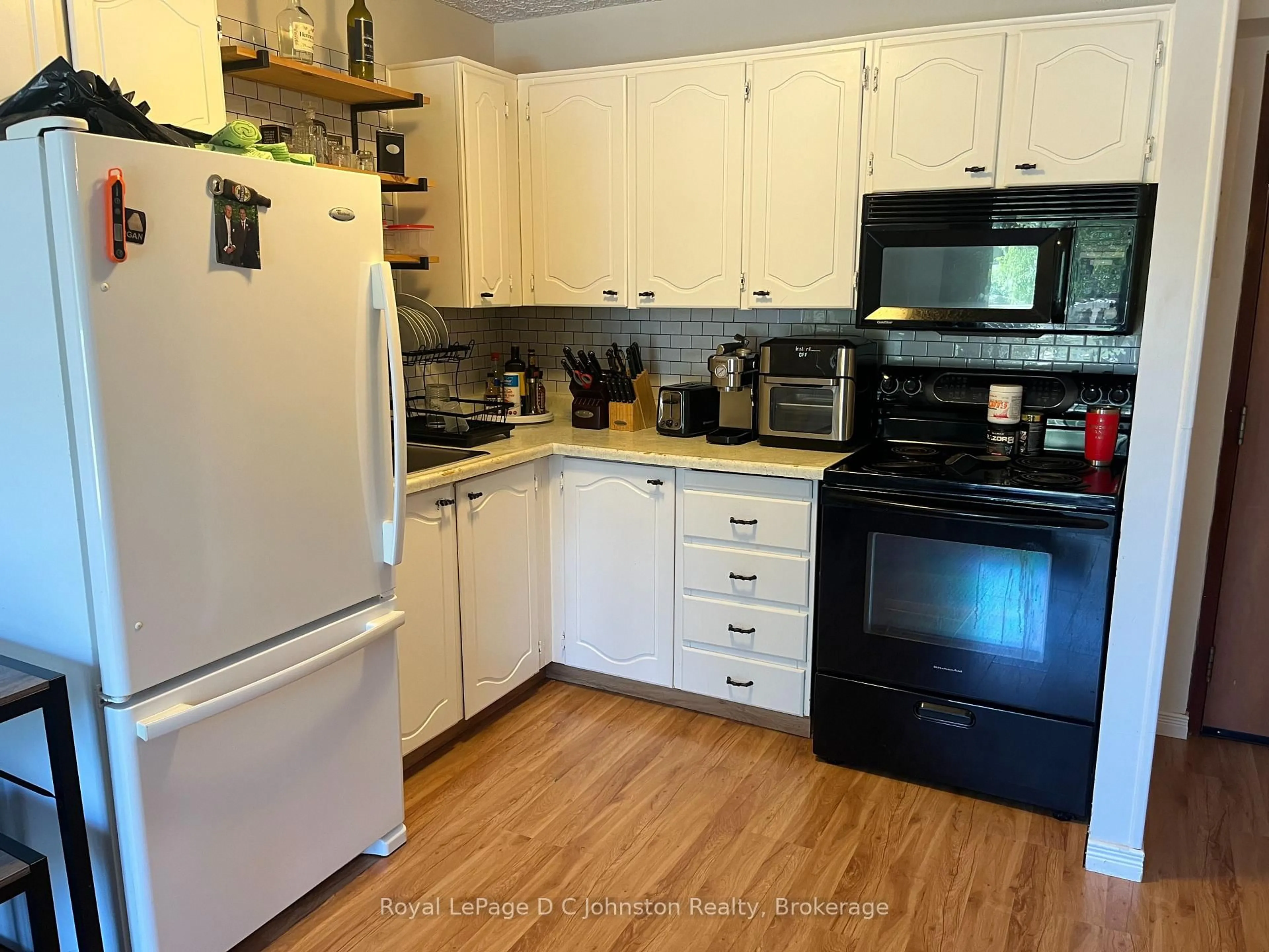 Standard kitchen, wood/laminate floor for 229 Adelaide St #209, Saugeen Shores Ontario N0H 2L0