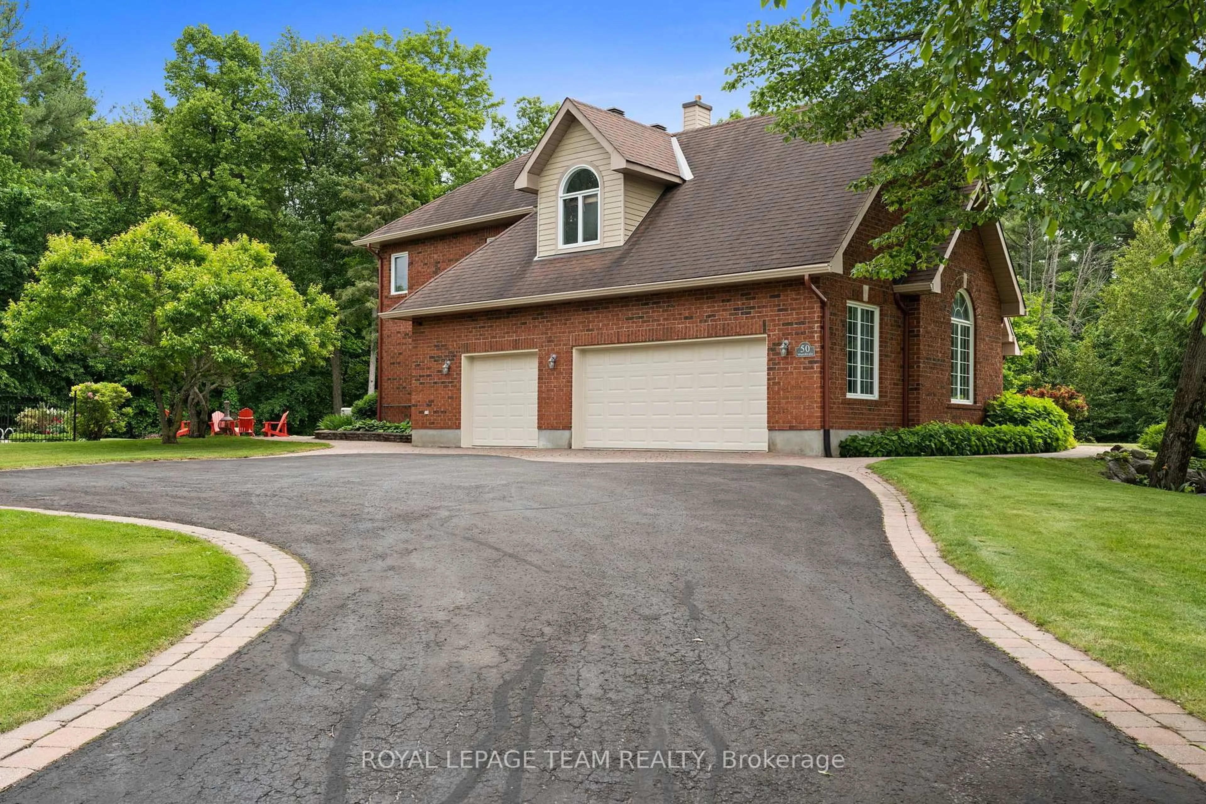 Home with brick exterior material, street for 50 Marchvale Dr, Ottawa Ontario K2W 1C2