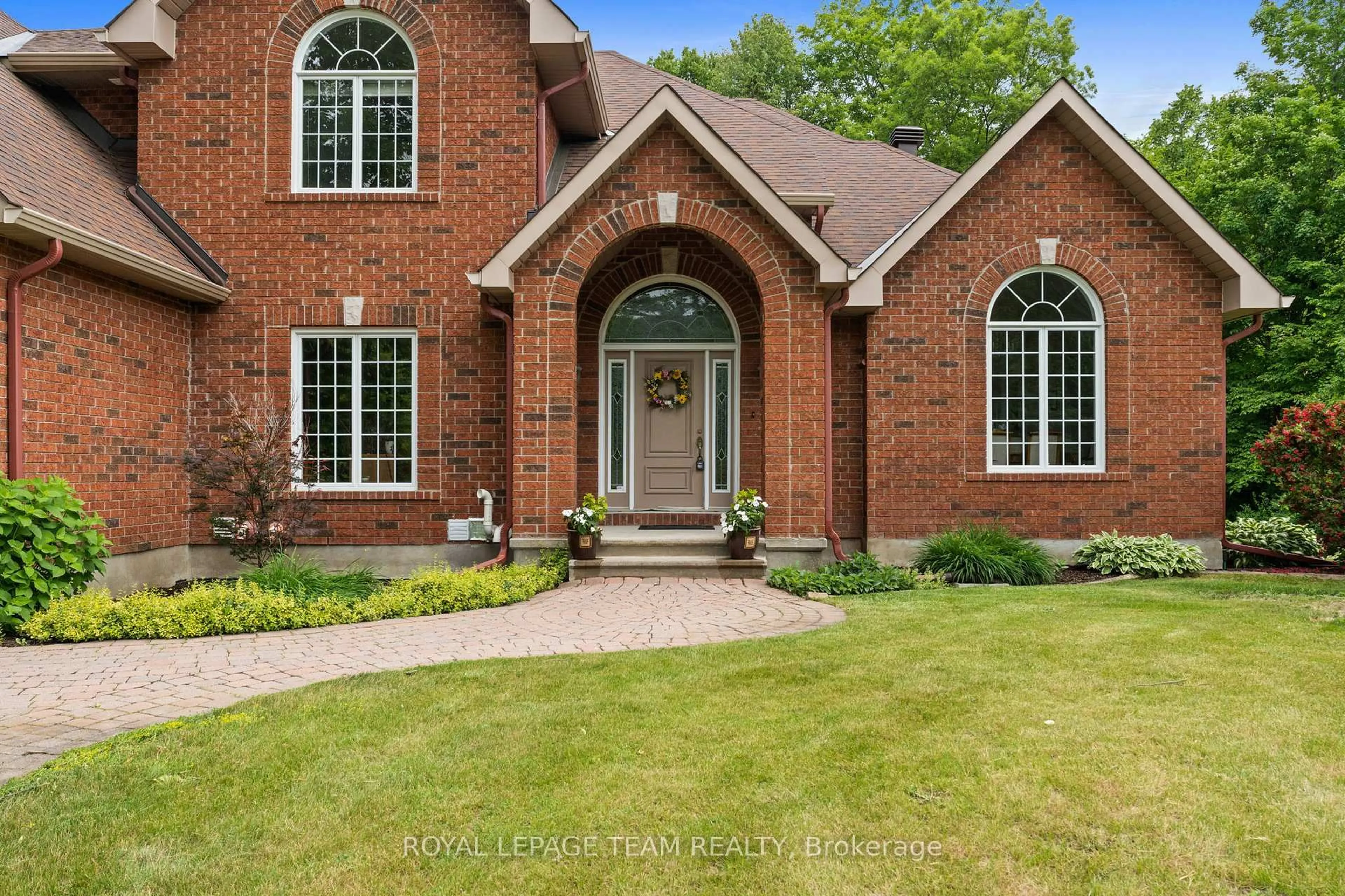 Home with brick exterior material, street for 50 Marchvale Dr, Ottawa Ontario K2W 1C2