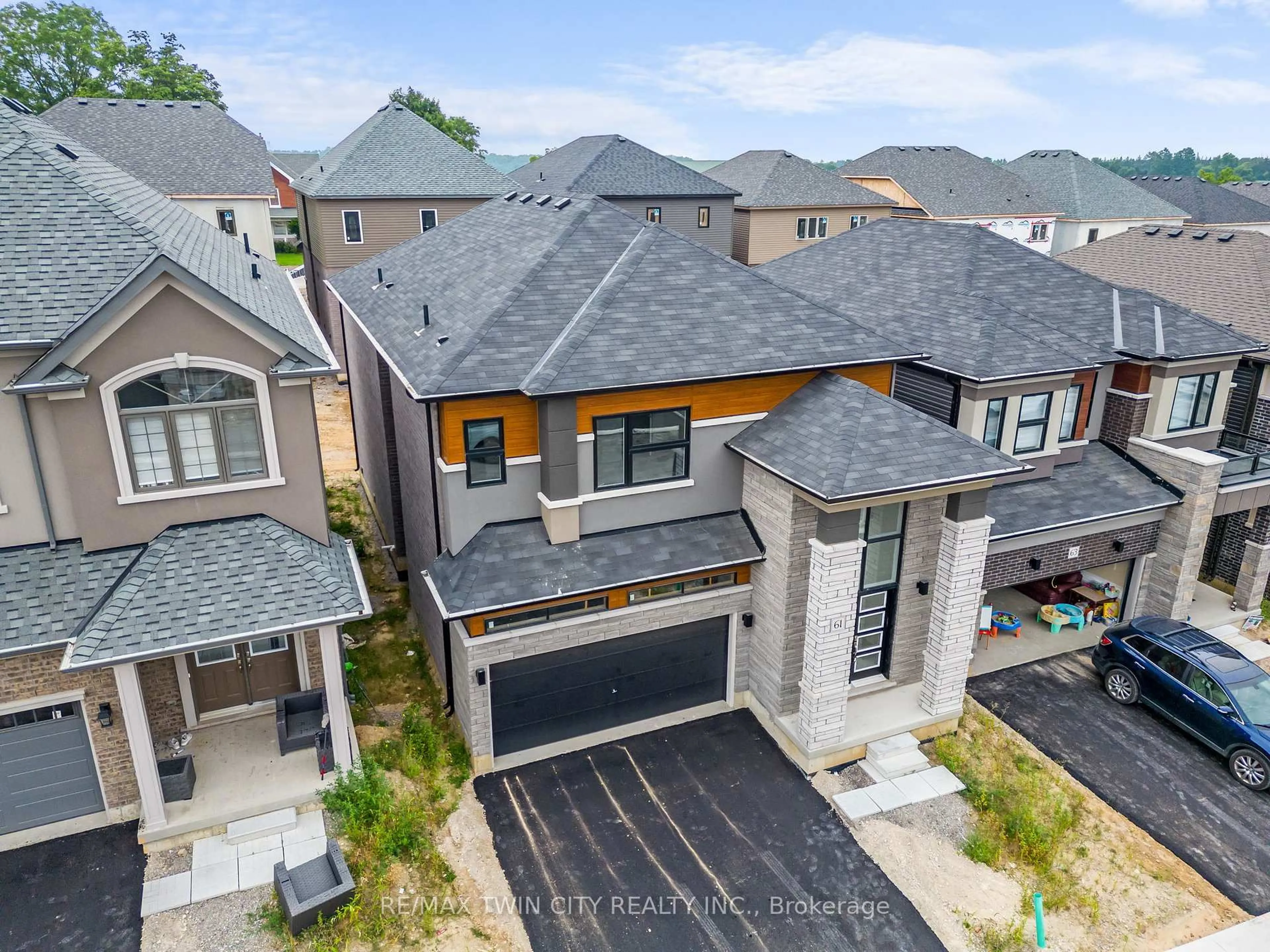 A pic from outside/outdoor area/front of a property/back of a property/a pic from drone, street for 61 George Brier Dr, Brant Ontario N3L 4A2