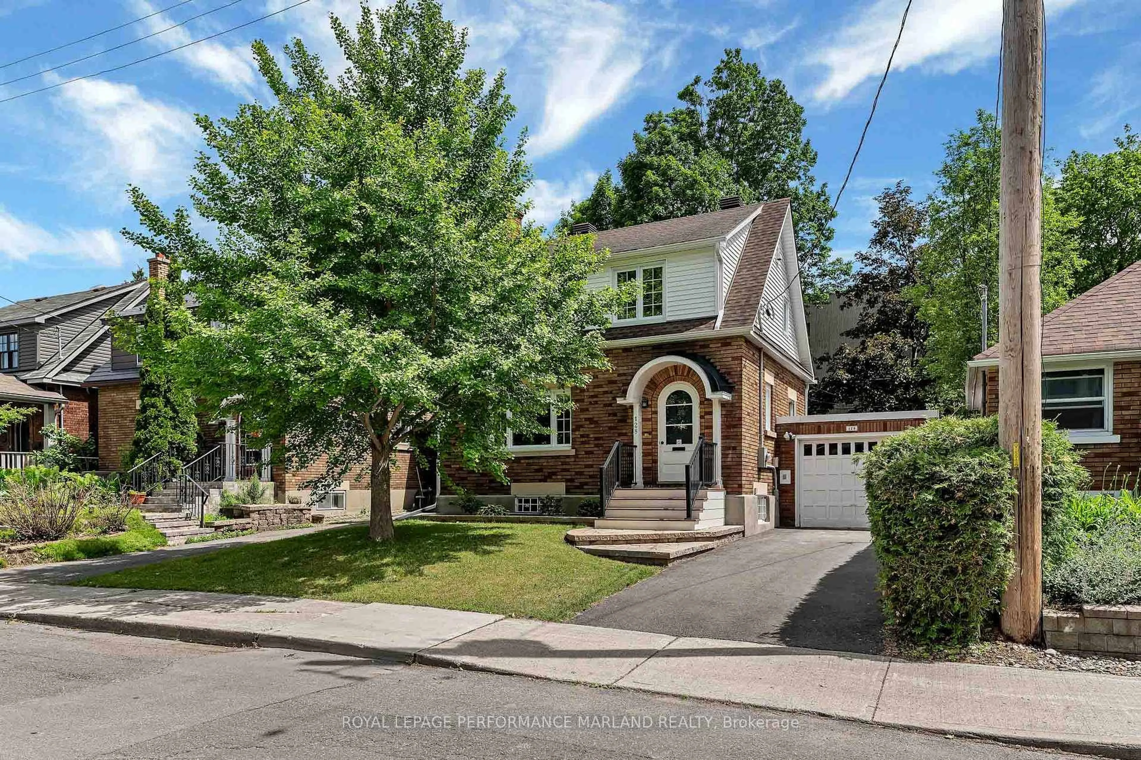 Home with brick exterior material, street for 128 Mason Terr, Ottawa Ontario K1S 0L3