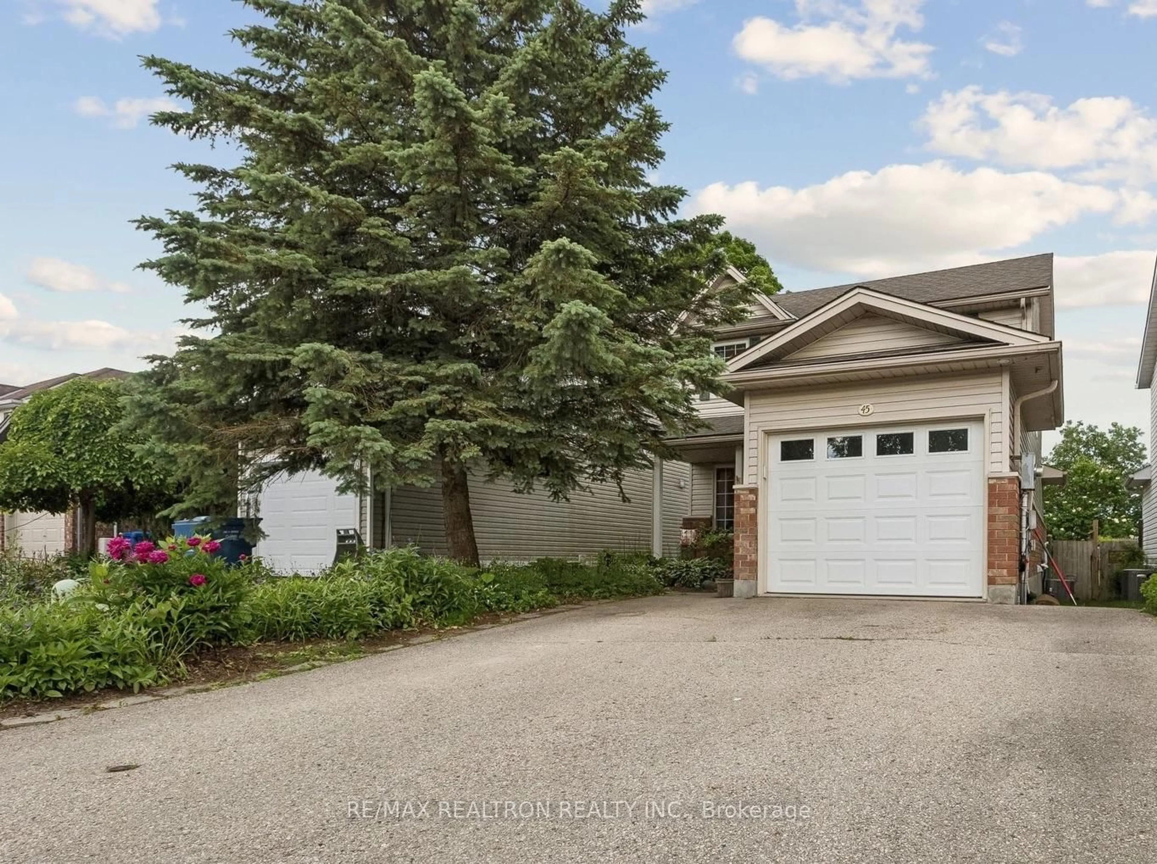 A pic from outside/outdoor area/front of a property/back of a property/a pic from drone, street for 45 Waxwing Cres, Guelph Ontario N1C 1E3