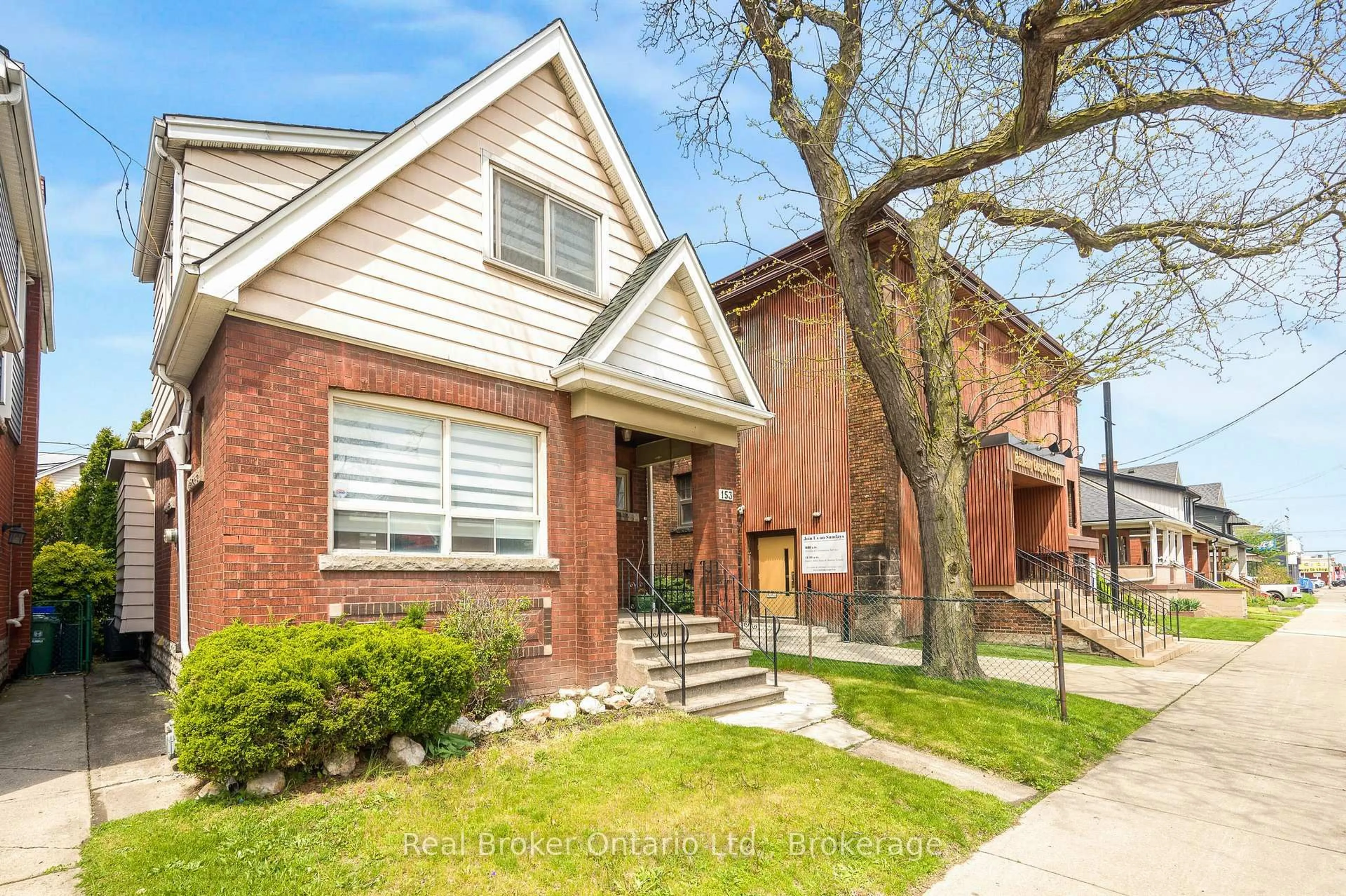 Home with brick exterior material, street for 153 Gage Ave, Hamilton Ontario L8L 7A3