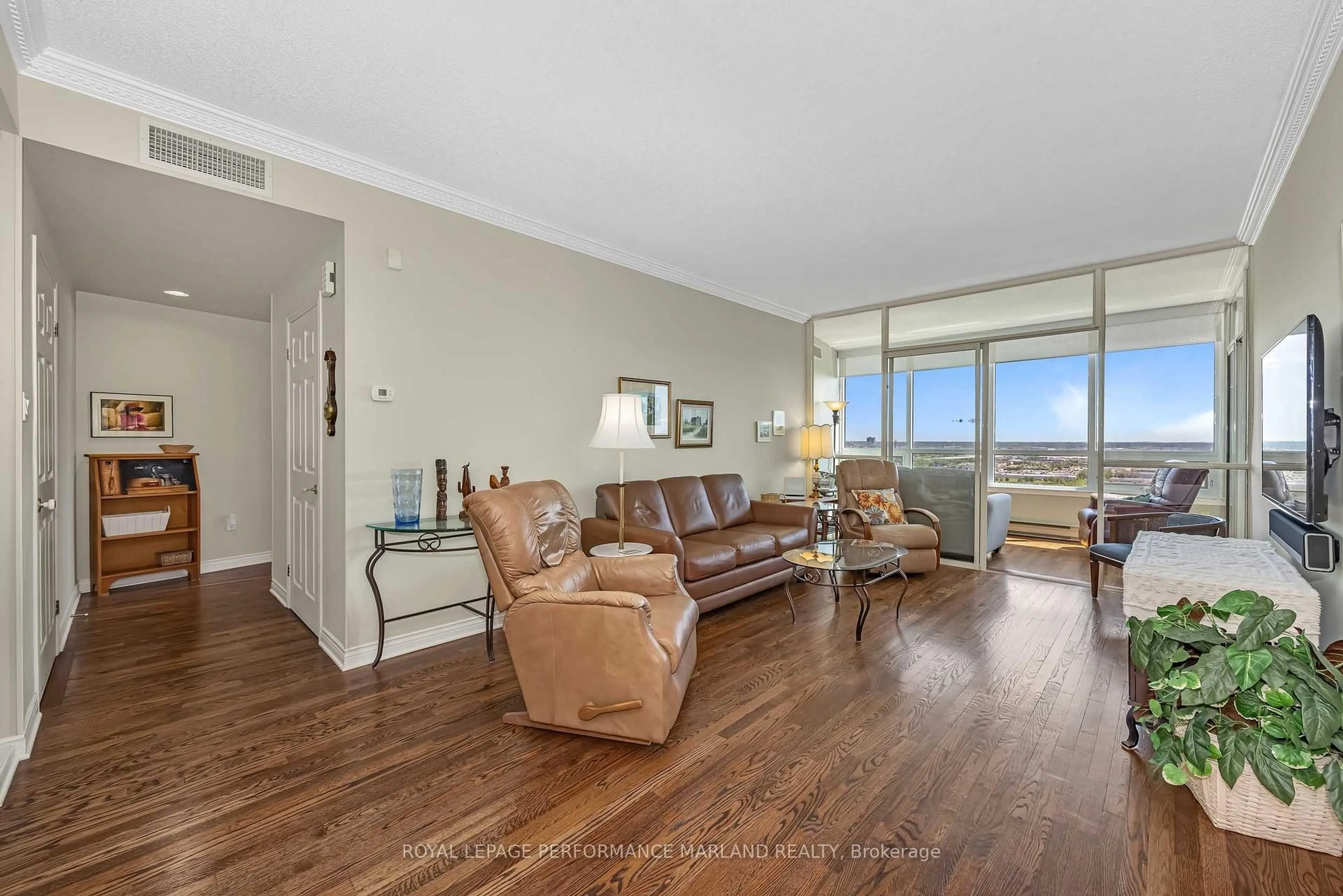 Living room with furniture, unknown for 1480 Riverside Dr #2004, Ottawa Ontario K1G 5H2