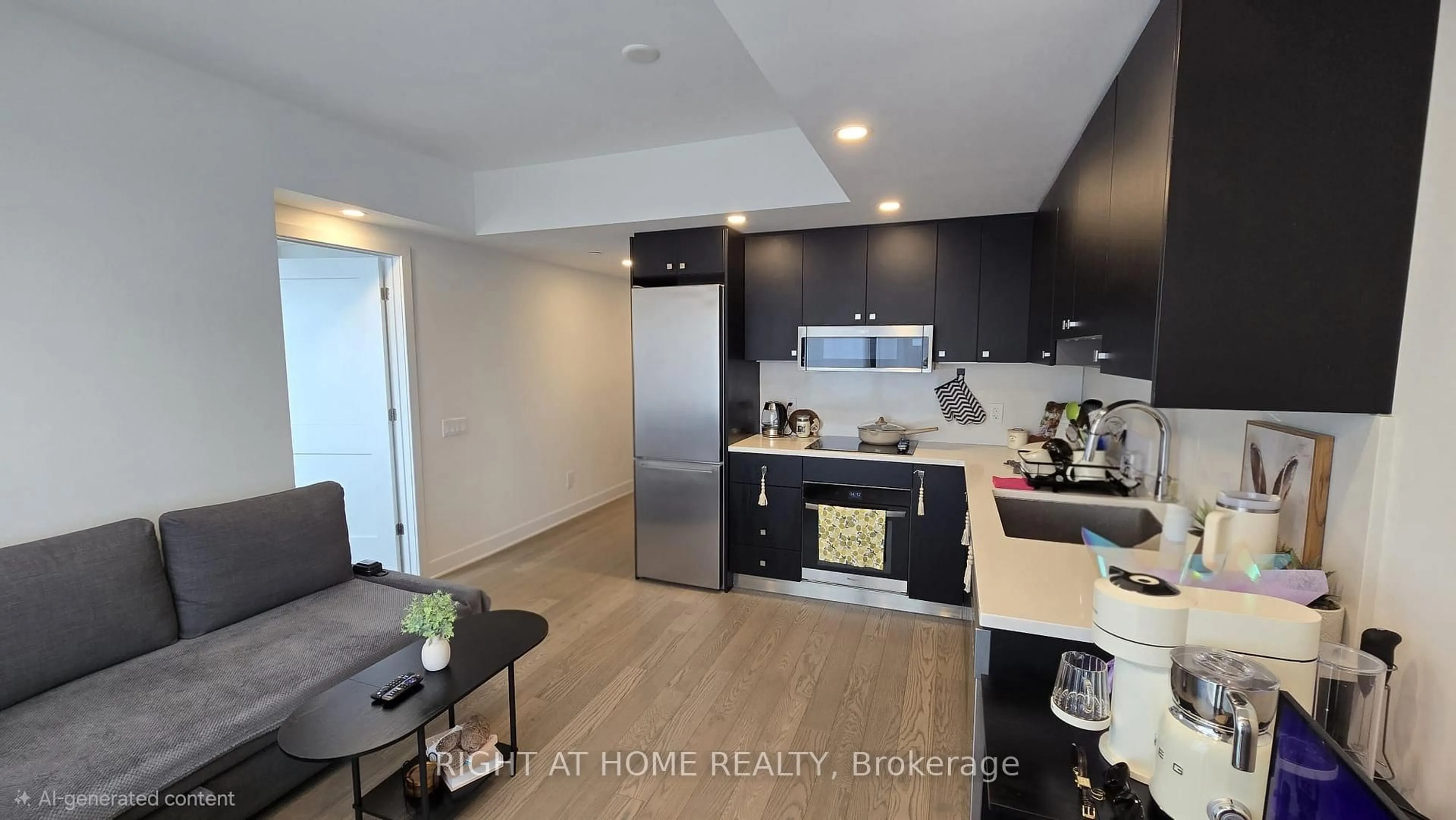 Open concept kitchen, wood/laminate floor for 180 George St #2405, Ottawa Ontario K1N 0G8
