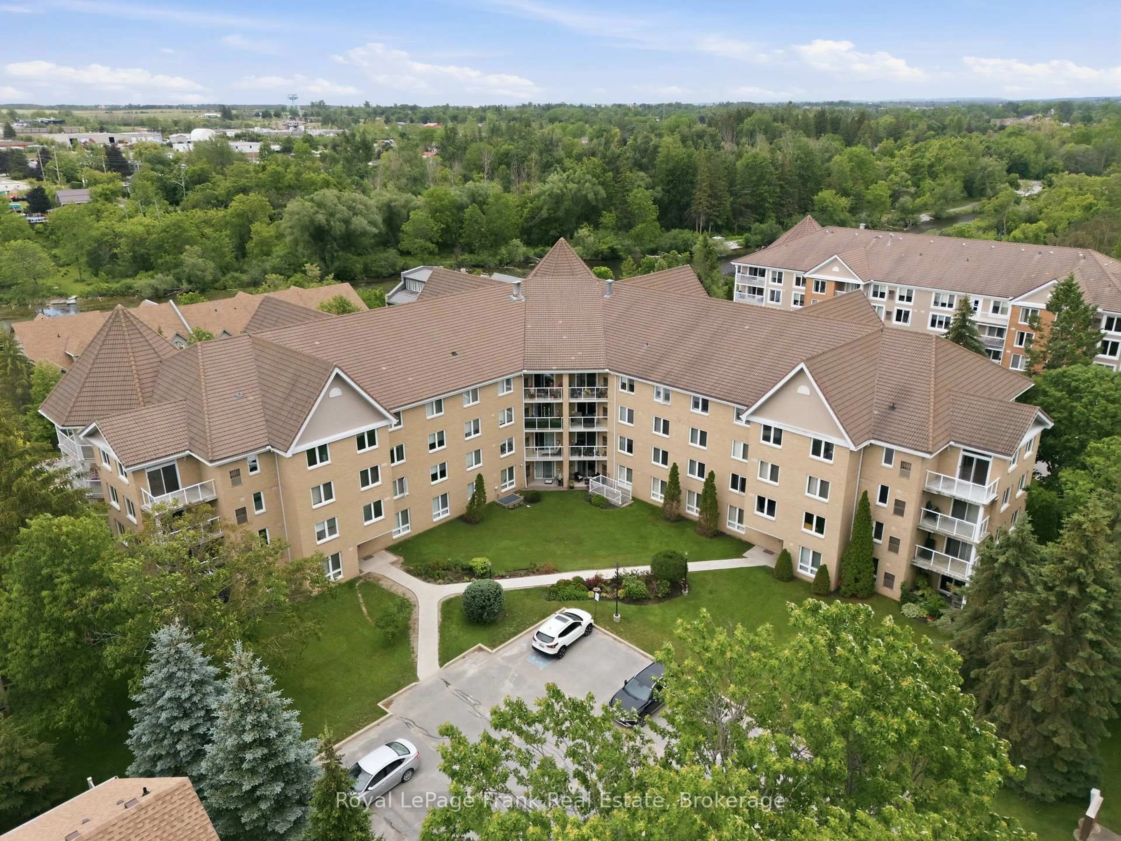 A pic from outside/outdoor area/front of a property/back of a property/a pic from drone, unknown for 51 Rivermill Blvd #110, Kawartha Lakes Ontario K9V 6E8