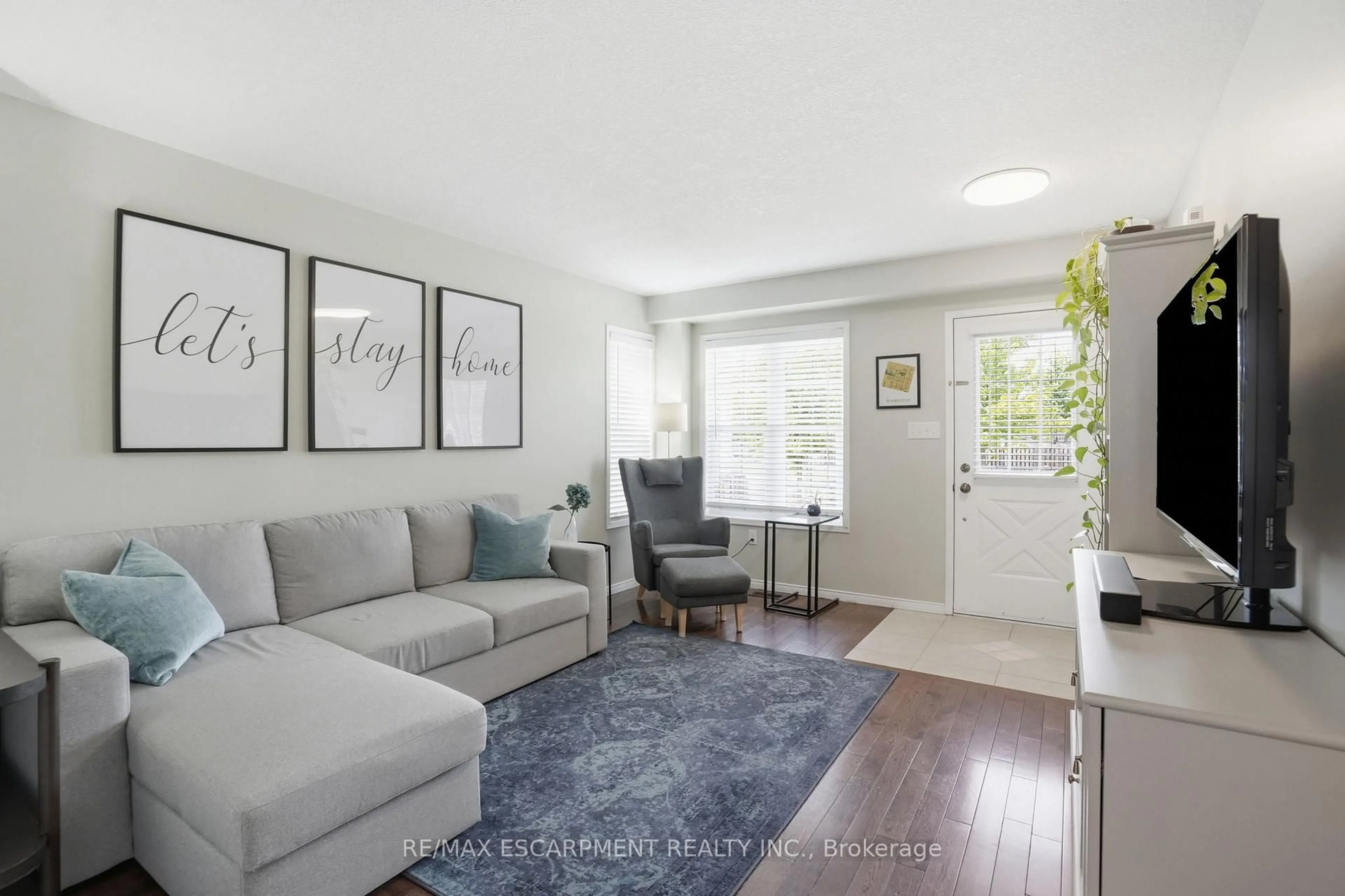 Living room with furniture, unknown for 263 Windwood Dr, Hamilton Ontario L0R 1C0