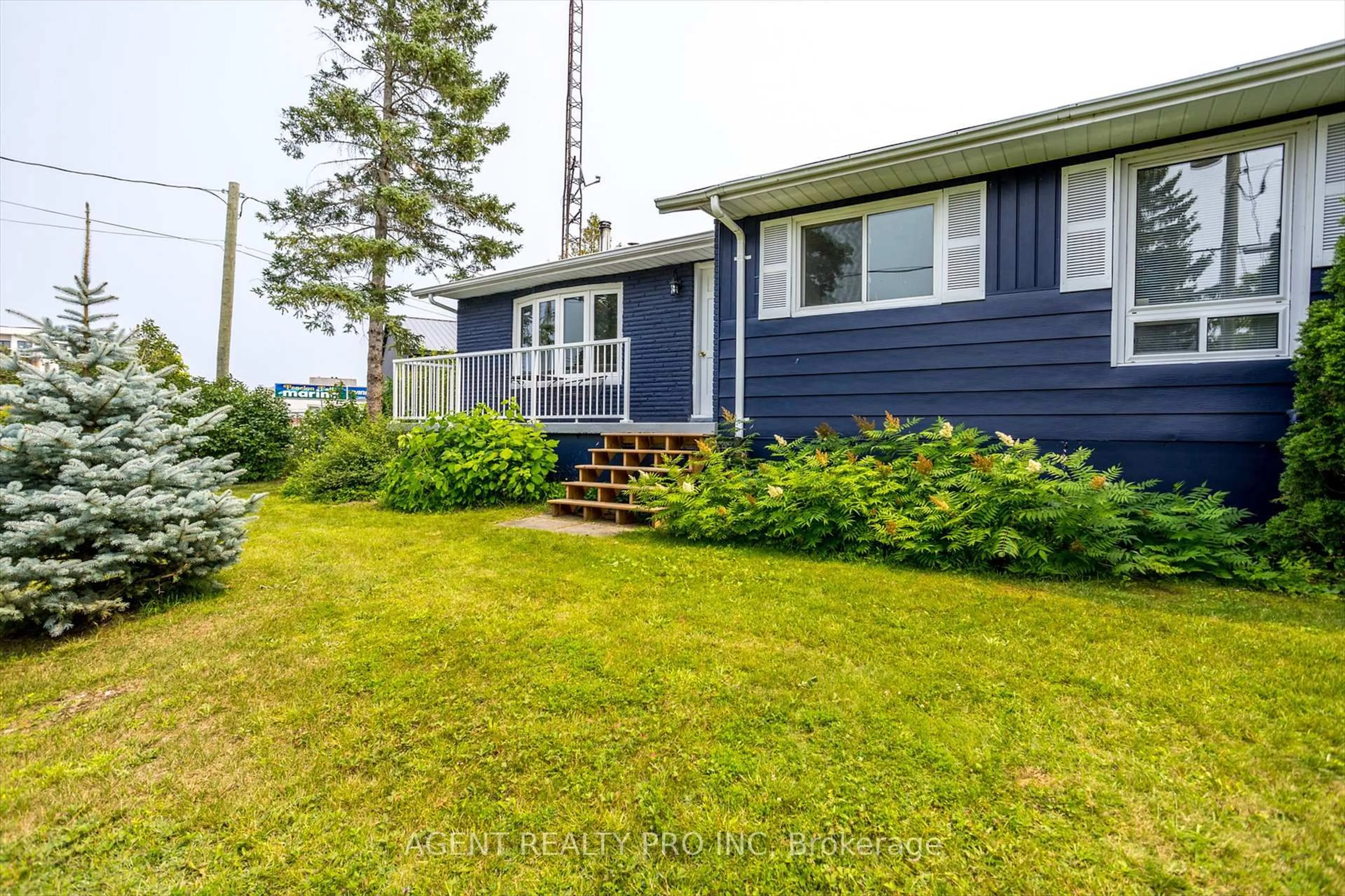 Home with vinyl exterior material, street for 21 Oriole Rd, Kawartha Lakes Ontario K0M 1N0