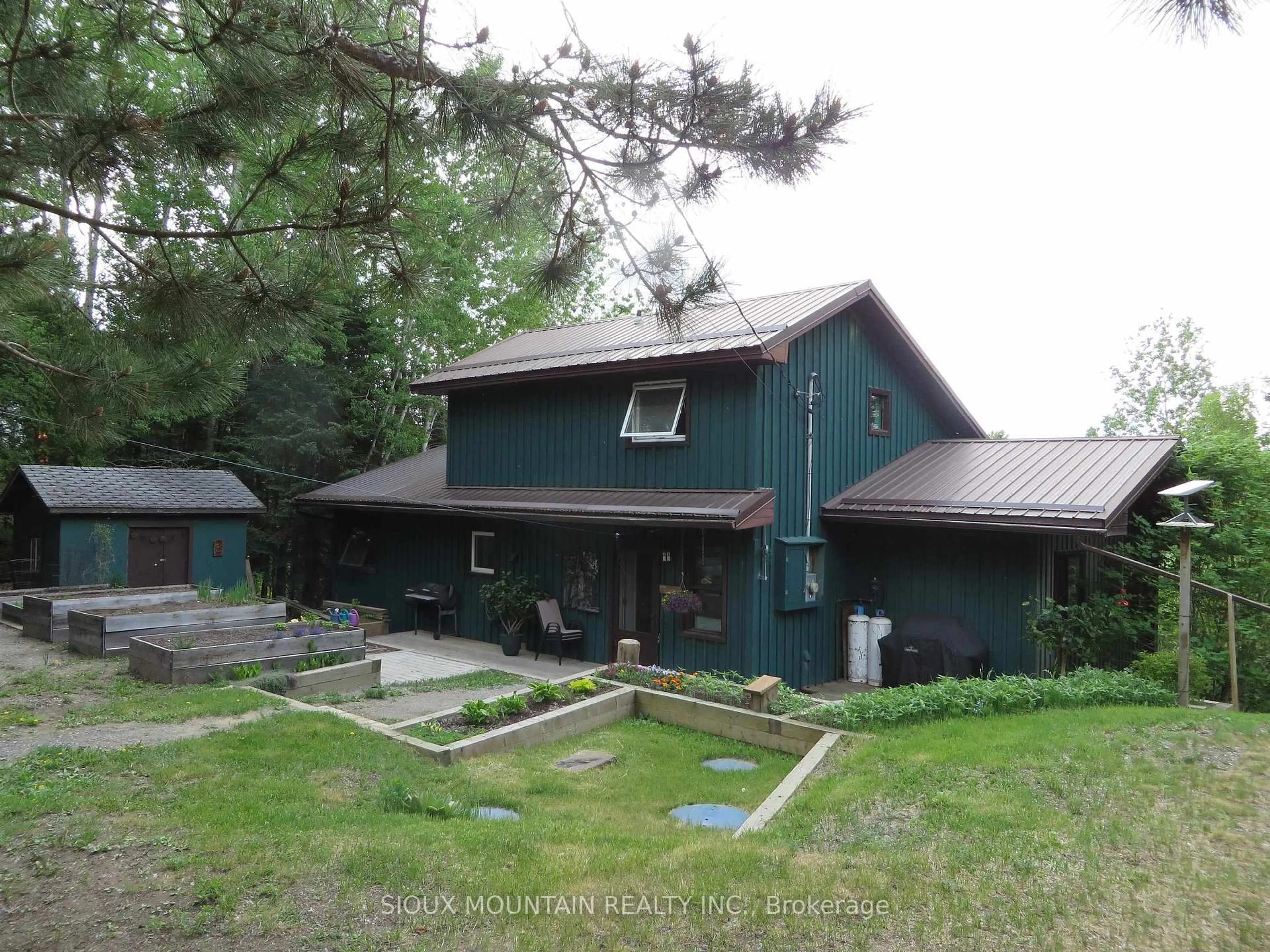 A pic from outside/outdoor area/front of a property/back of a property/a pic from drone, unknown for 169 Voyageur's North Road, Sioux Lookout Ontario P8T 0A7