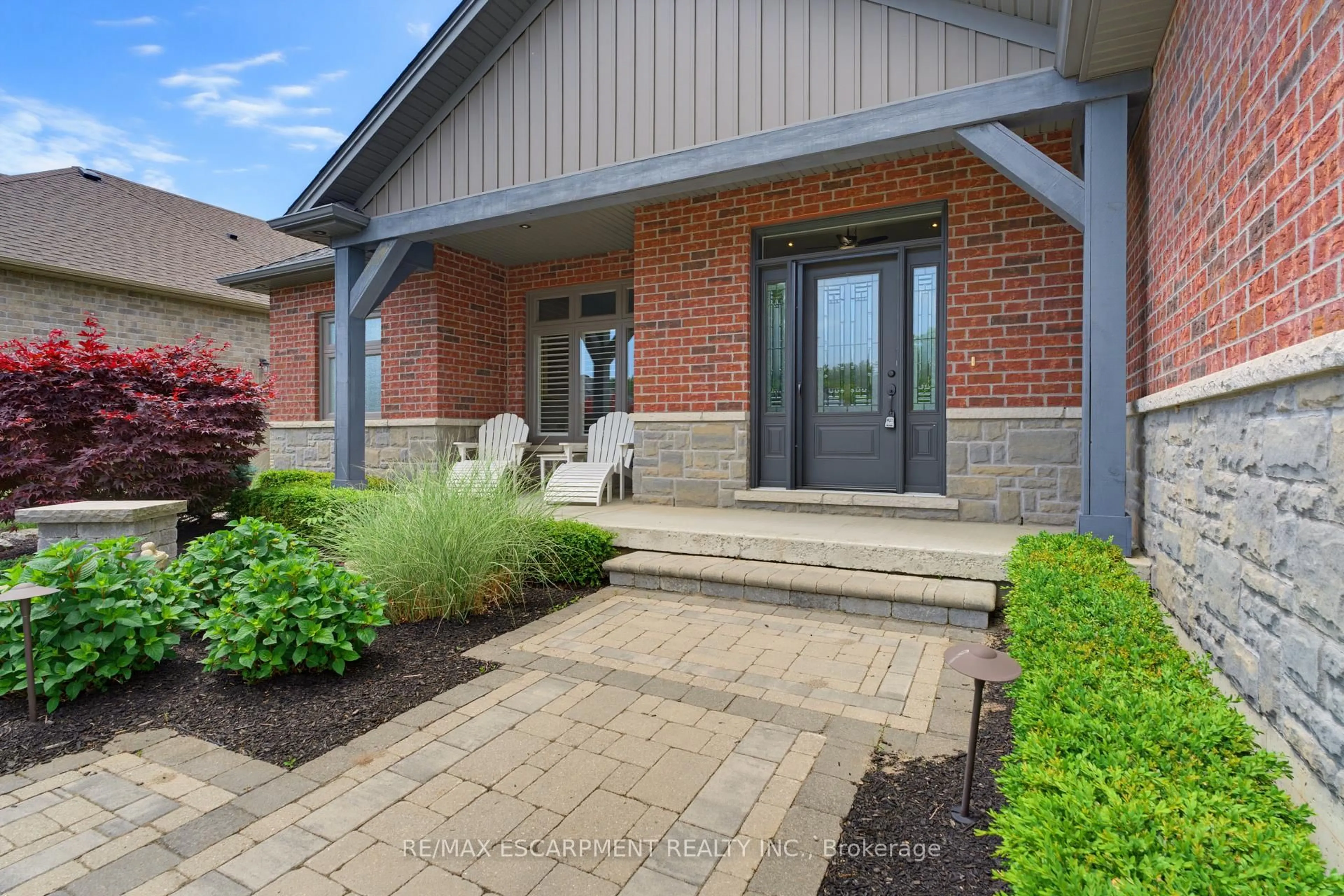 Home with brick exterior material, street for 15 Bluenose Dr, Norfolk Ontario N0A 1N7