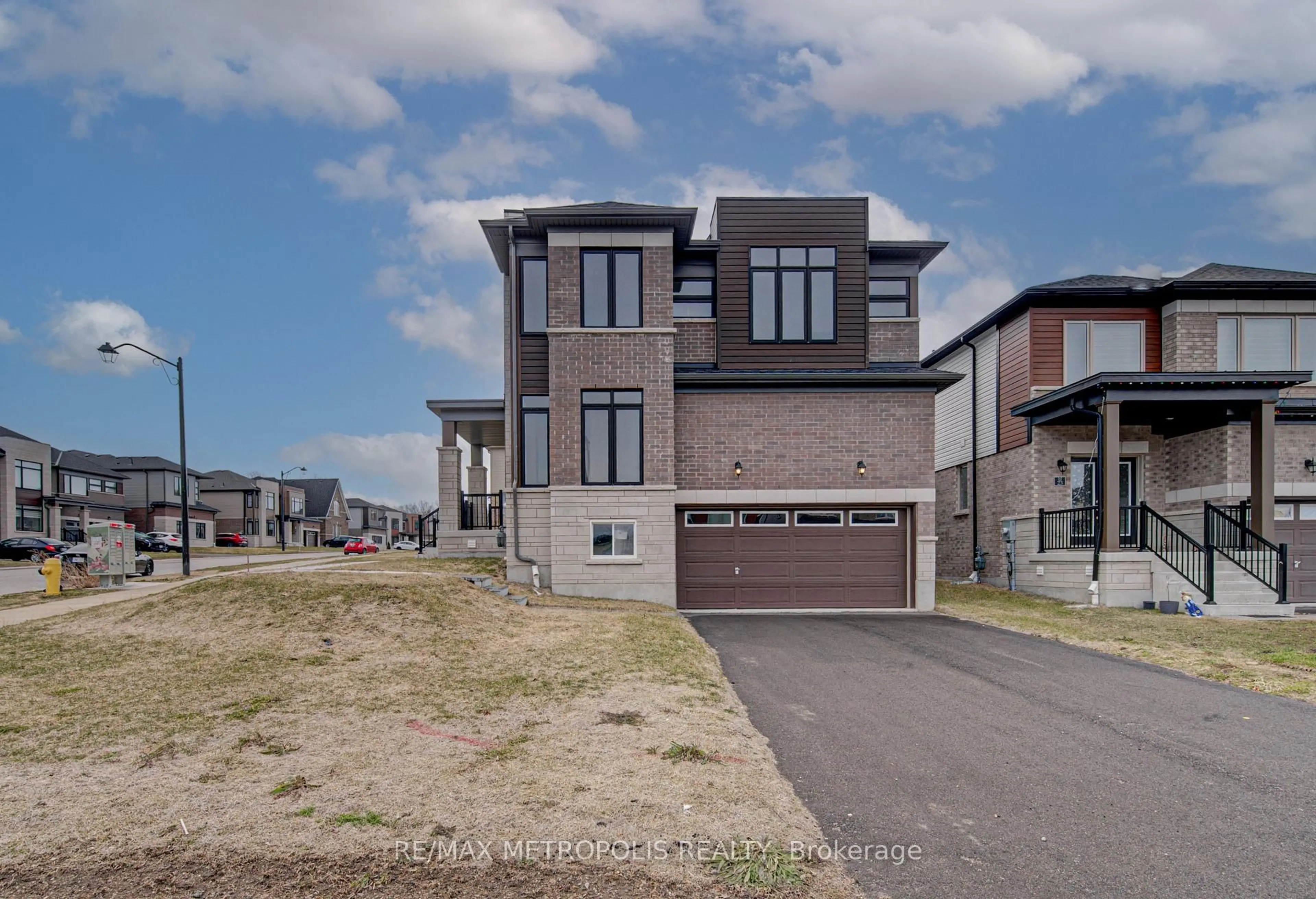 Home with brick exterior material, street for 25 Heming St, Brant Ontario N3L 0M6