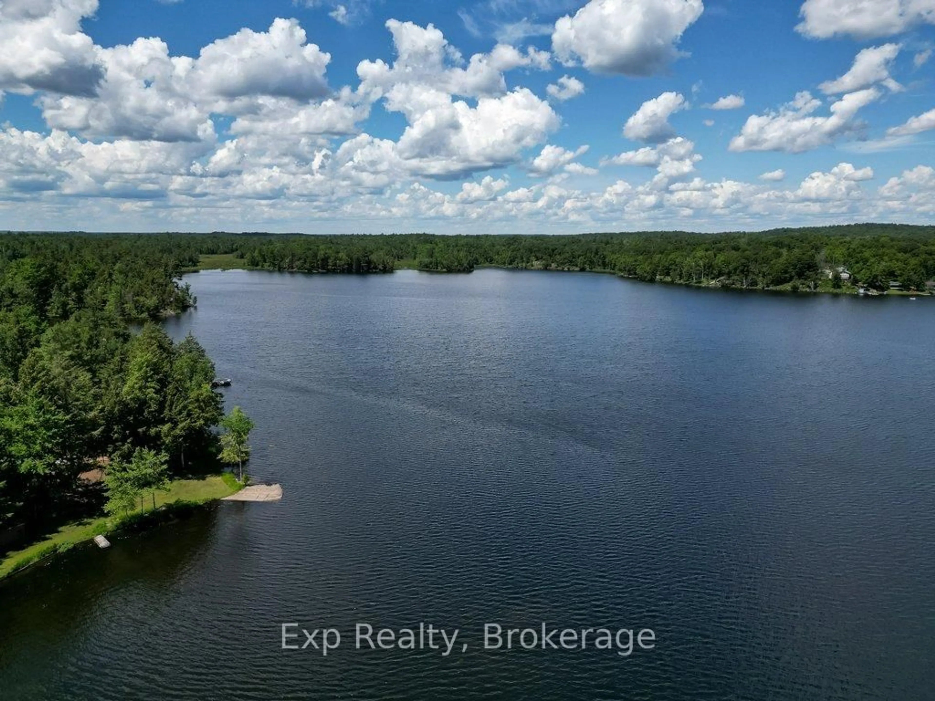 A pic from outside/outdoor area/front of a property/back of a property/a pic from drone, water/lake/river/ocean view for 40 Twin Shore Lane, Limoges Ontario K0K 2M0