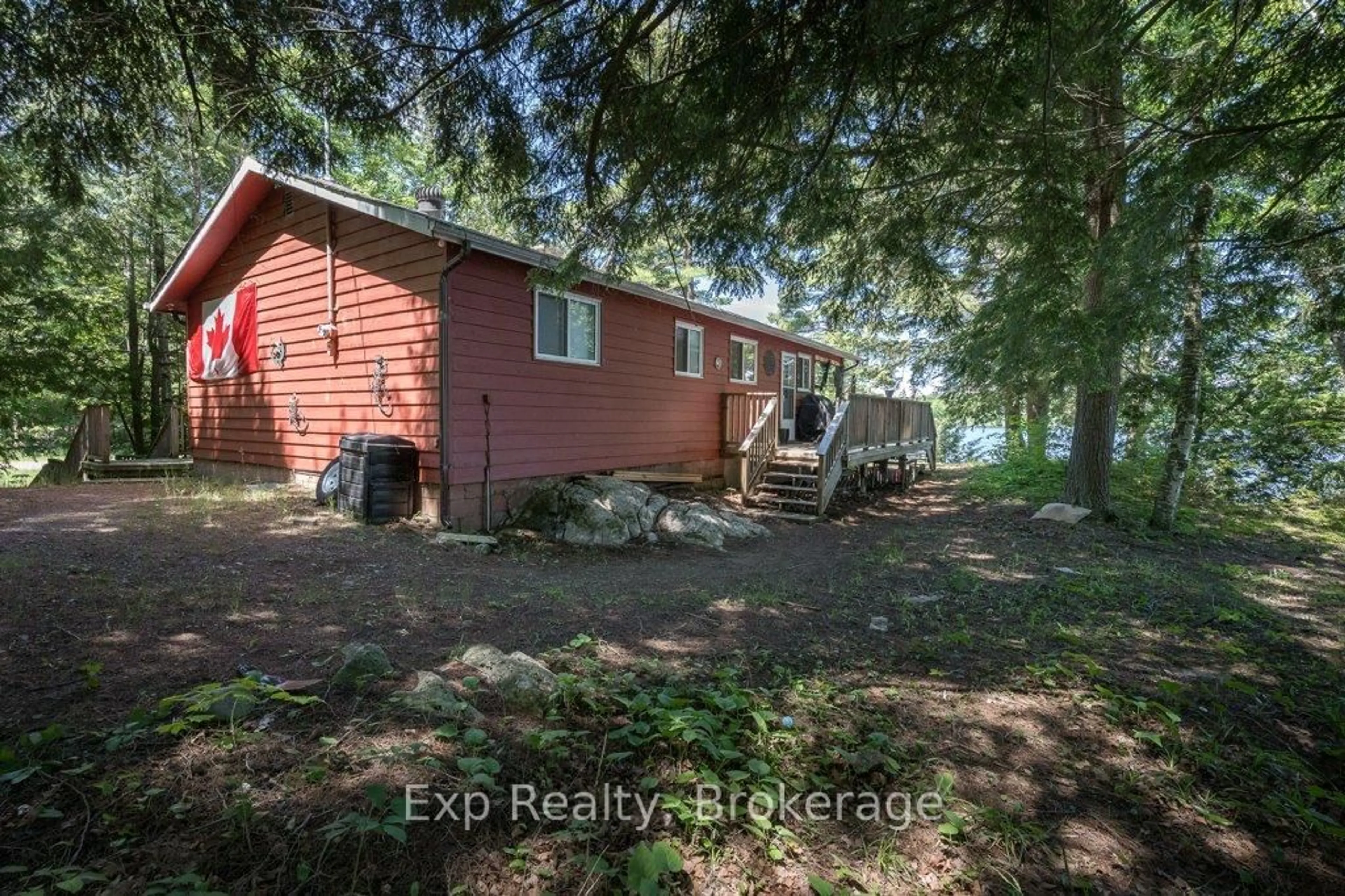 A pic from outside/outdoor area/front of a property/back of a property/a pic from drone, water/lake/river/ocean view for 40 Twin Shore Lane, Limoges Ontario K0K 2M0
