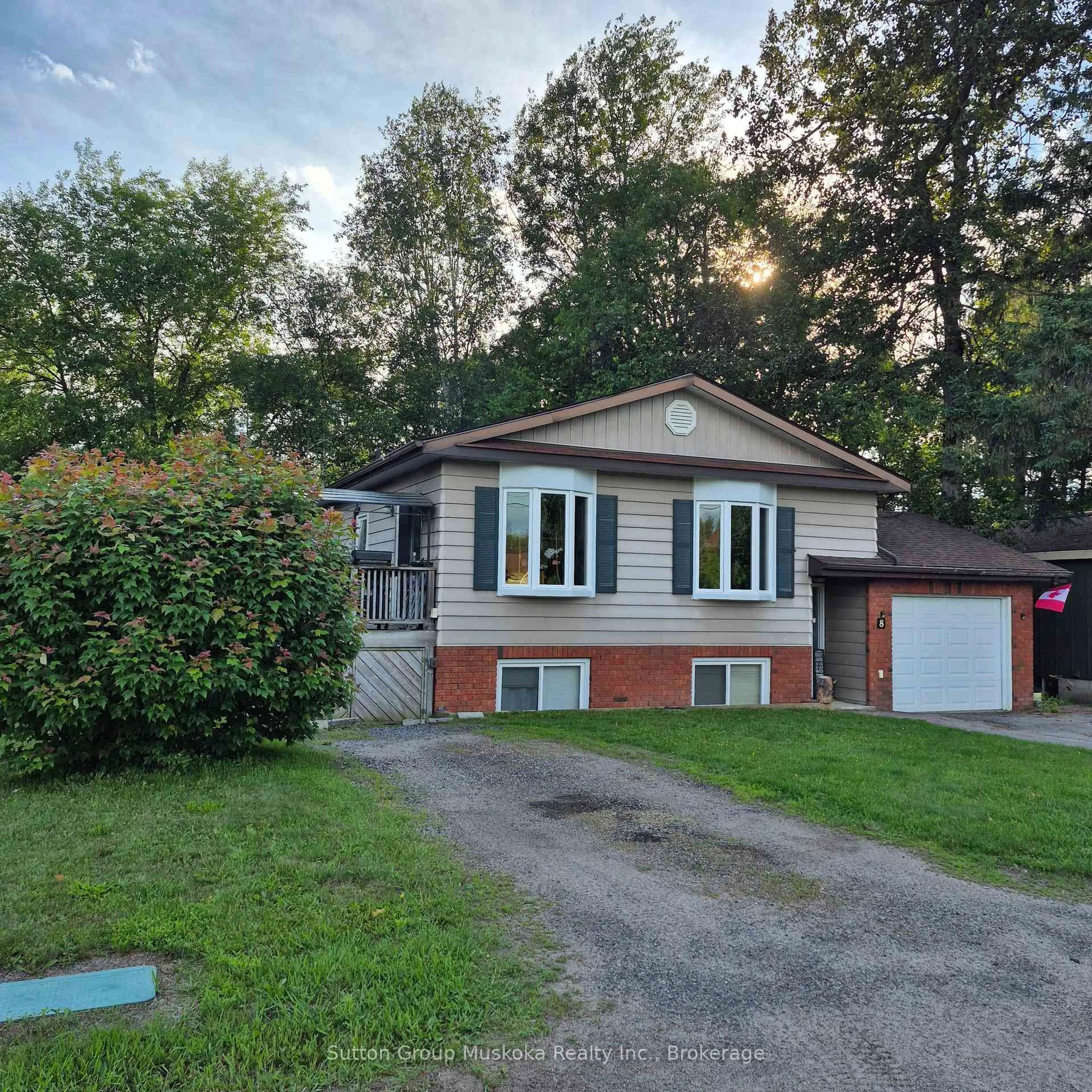 Home with vinyl exterior material, street for 8 Gouldie St, Huntsville Ontario P1H 1M5