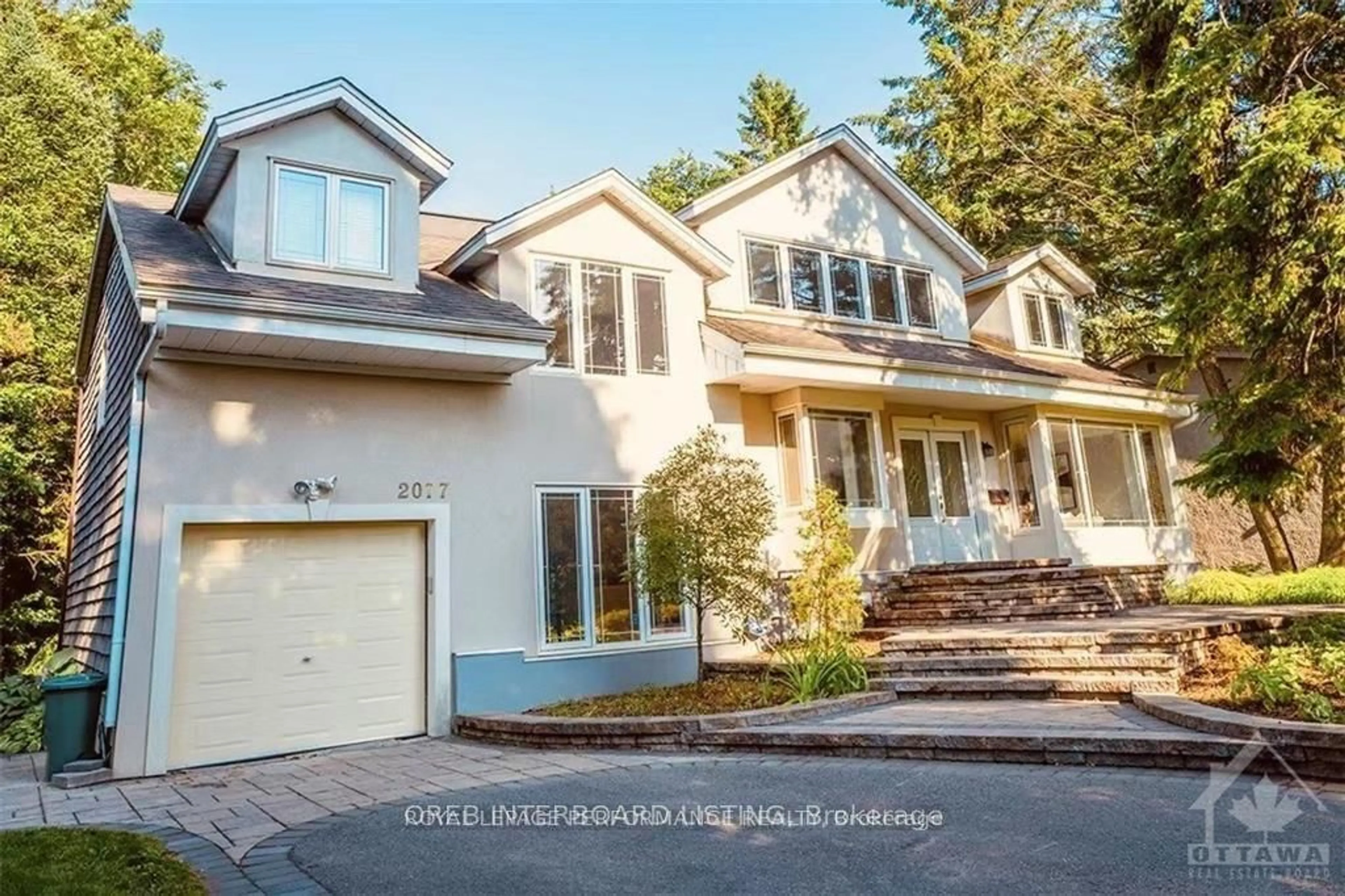 Home with vinyl exterior material, street for 2077 PALMER Ave, Ottawa Ontario K1H 5Z3