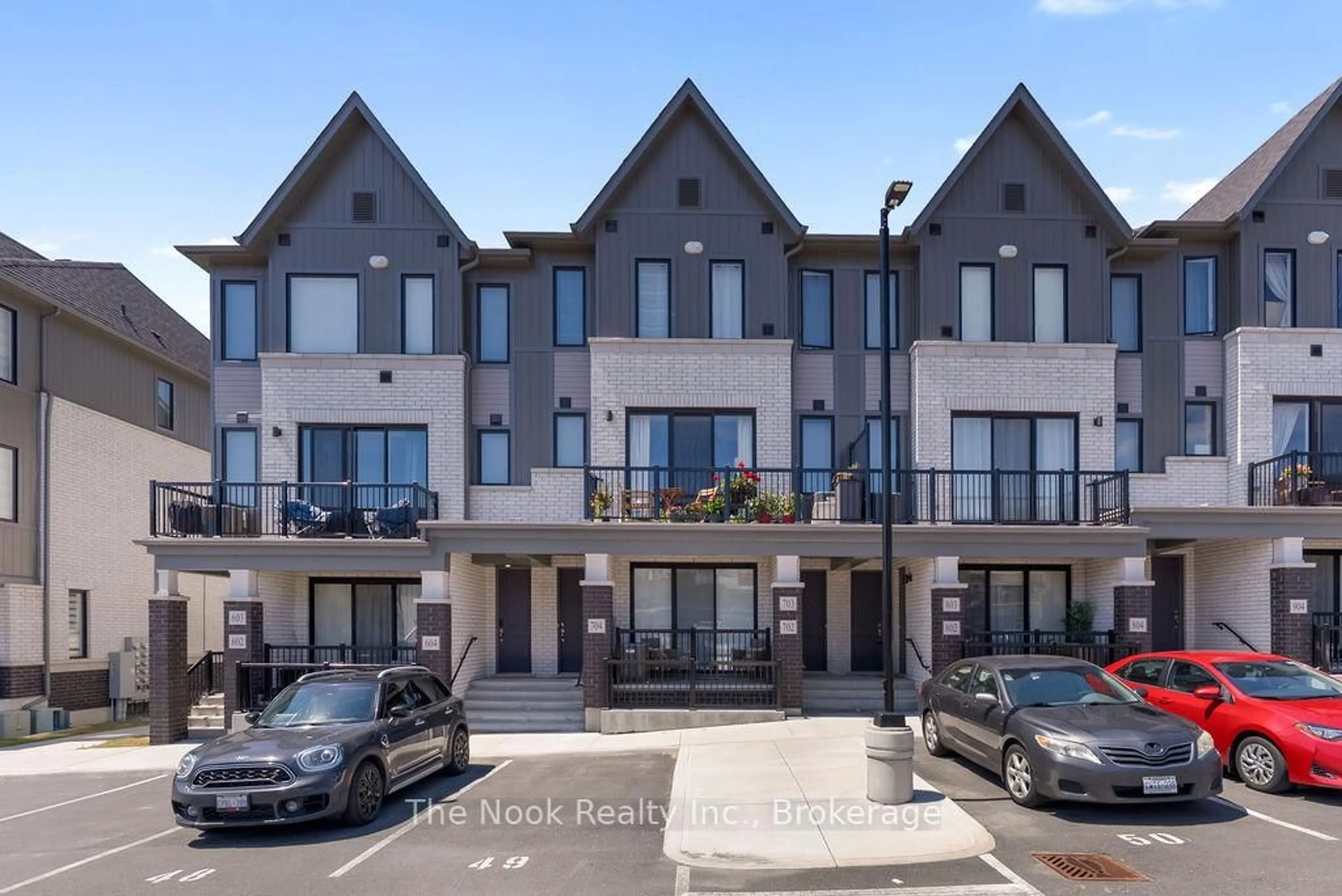A pic from outside/outdoor area/front of a property/back of a property/a pic from drone, street for 160 Densmore Rd #702, Cobourg Ontario K9A 0X8