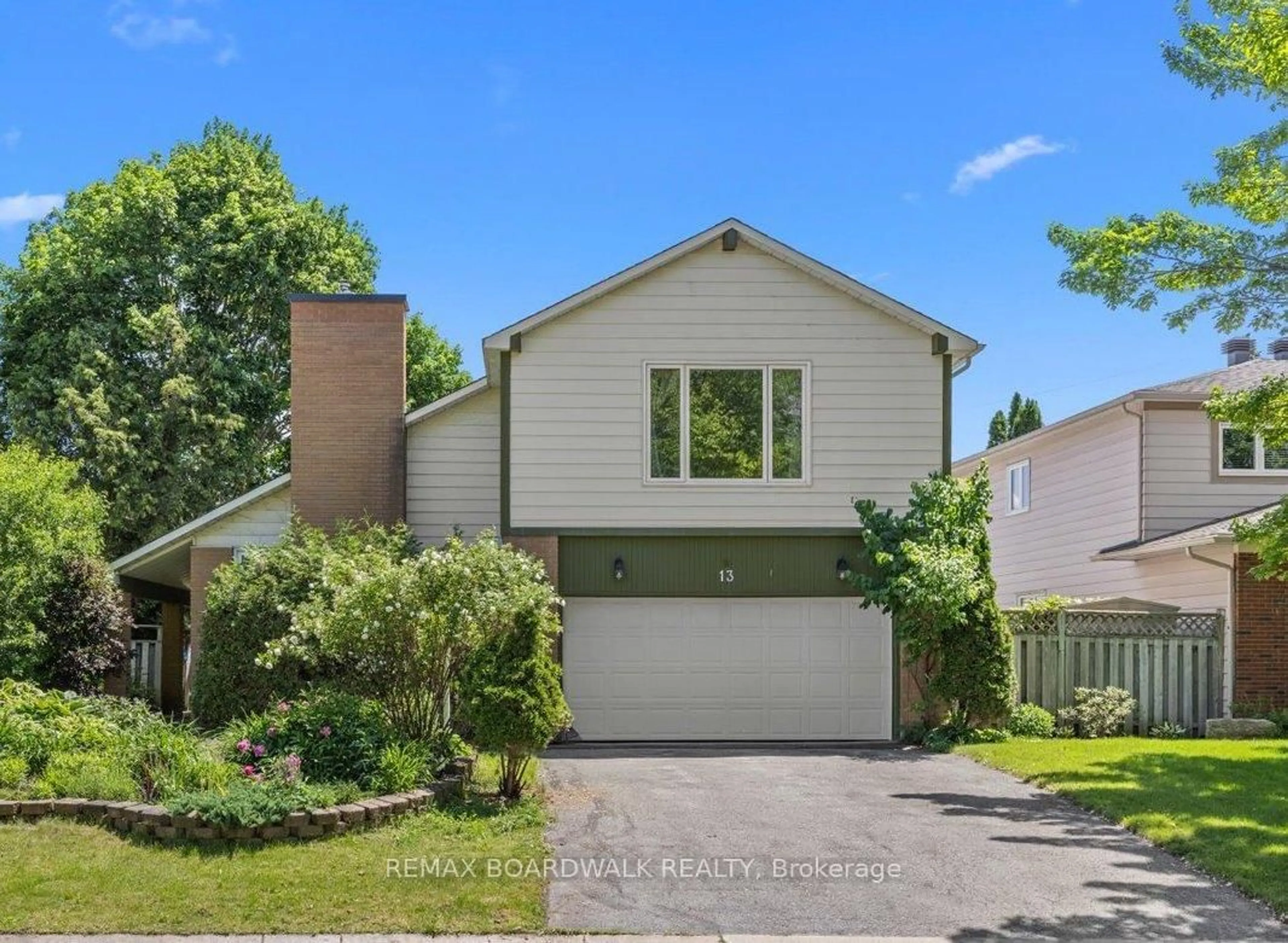 Home with vinyl exterior material, street for 13 Pommel Cres, Ottawa Ontario K2M 1A3