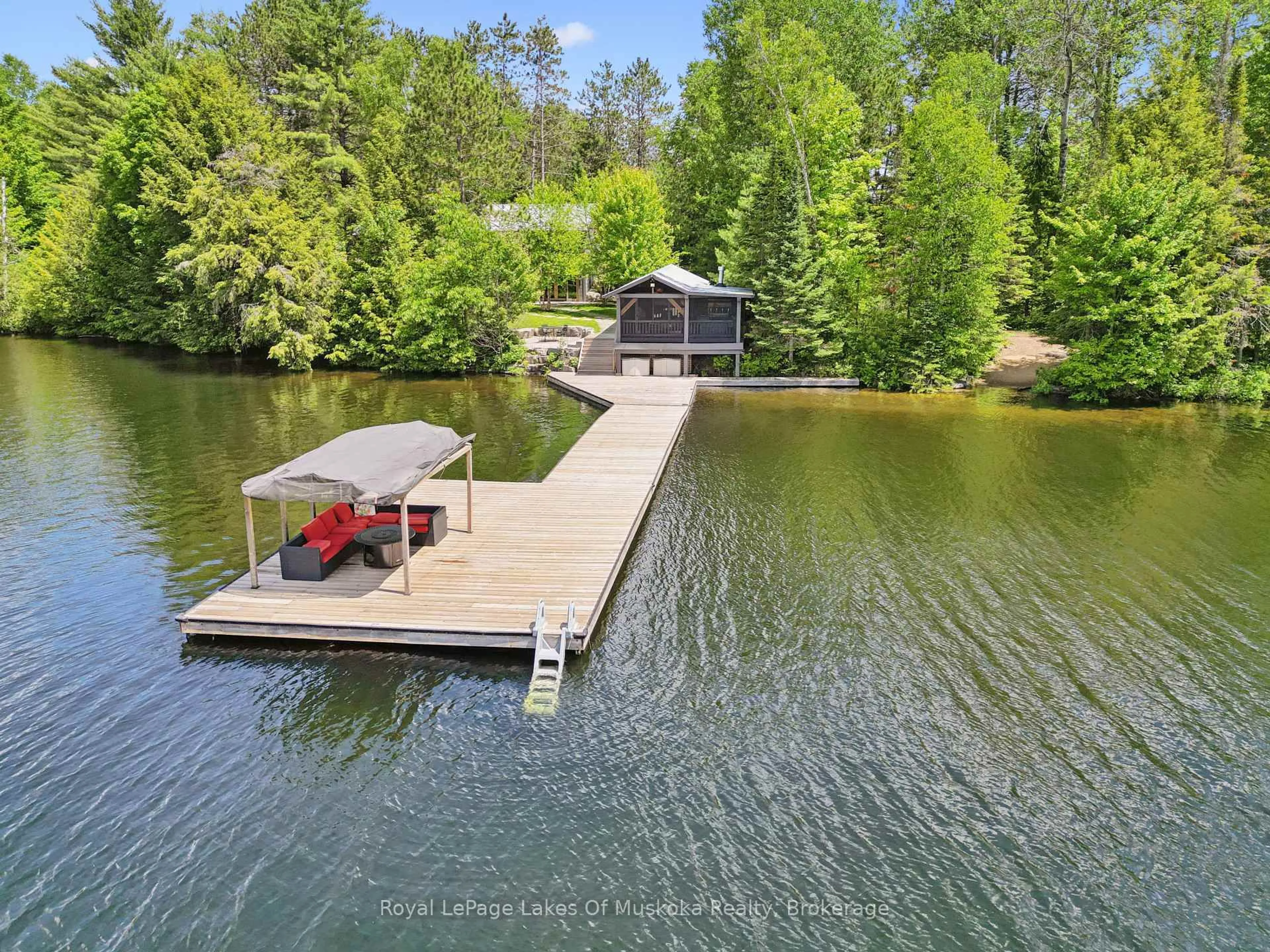 A pic from outside/outdoor area/front of a property/back of a property/a pic from drone, water/lake/river/ocean view for 1016 Swift Lane, Algonquin Highlands Ontario P0A 1E0