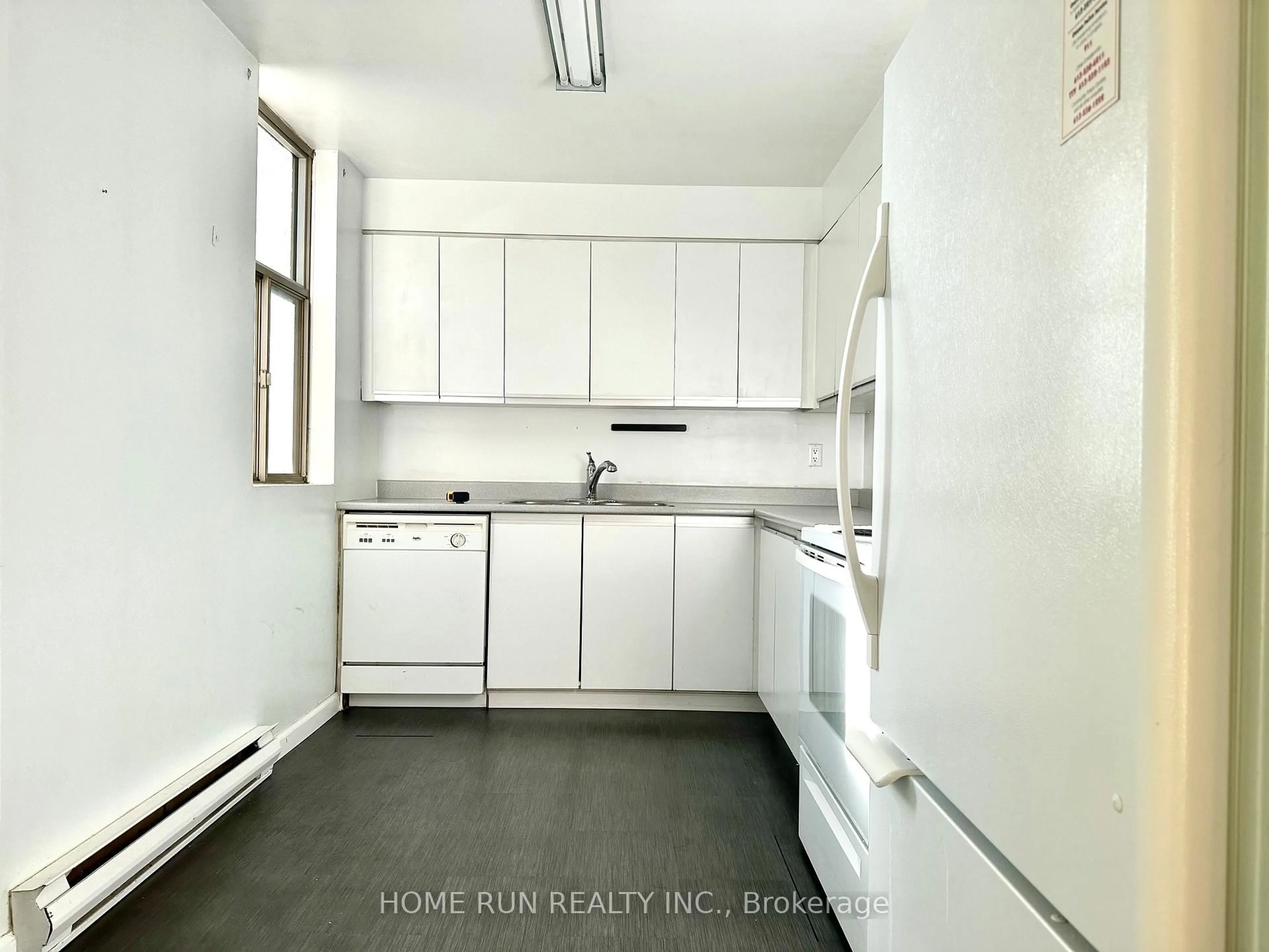 Kitchen with laundary machines, unknown for 2760 Carousel Cres #210, Ottawa Ontario K1T 2N4