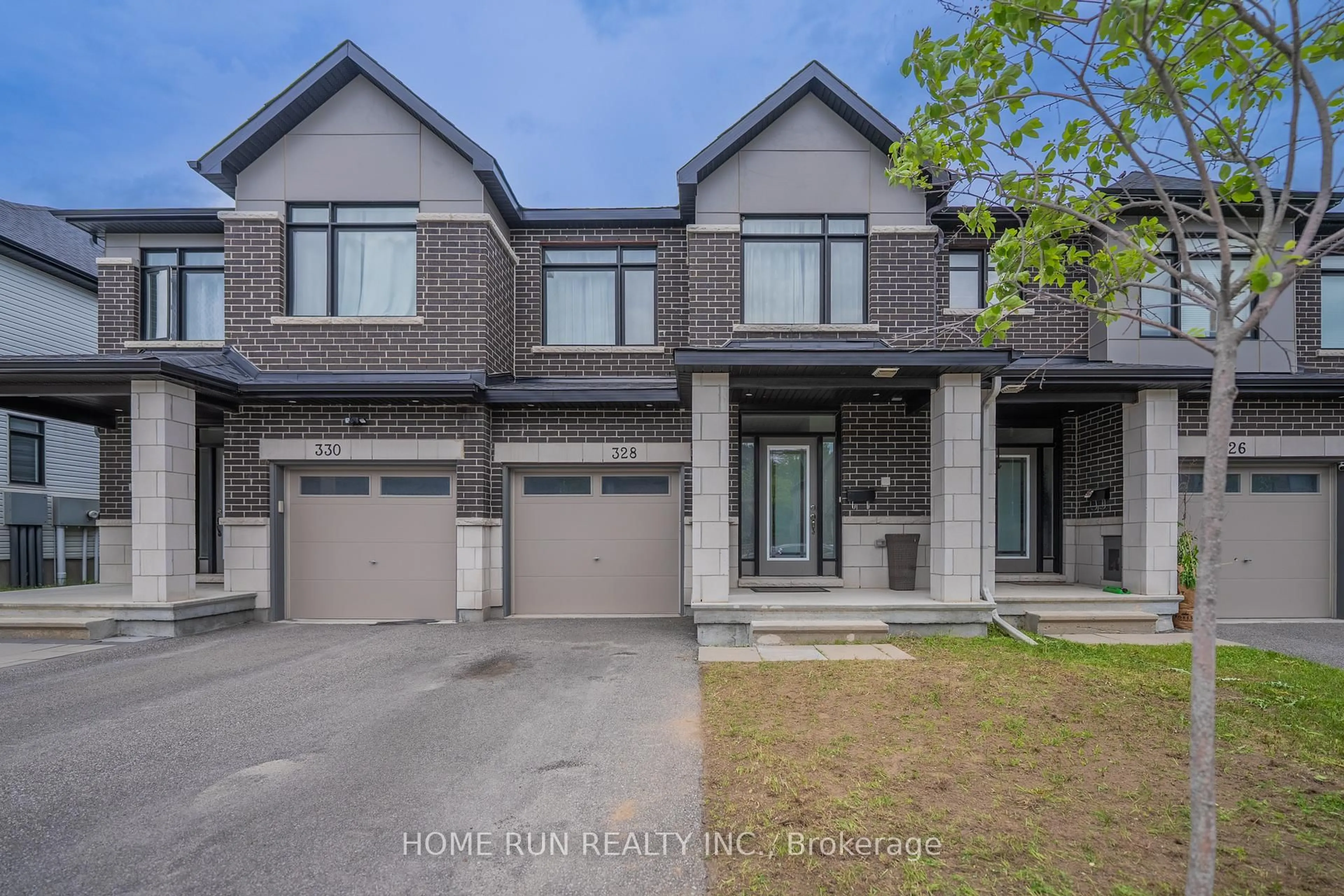 Home with brick exterior material, street for 328 Ibanez Walk, Ottawa Ontario K1T 0V8