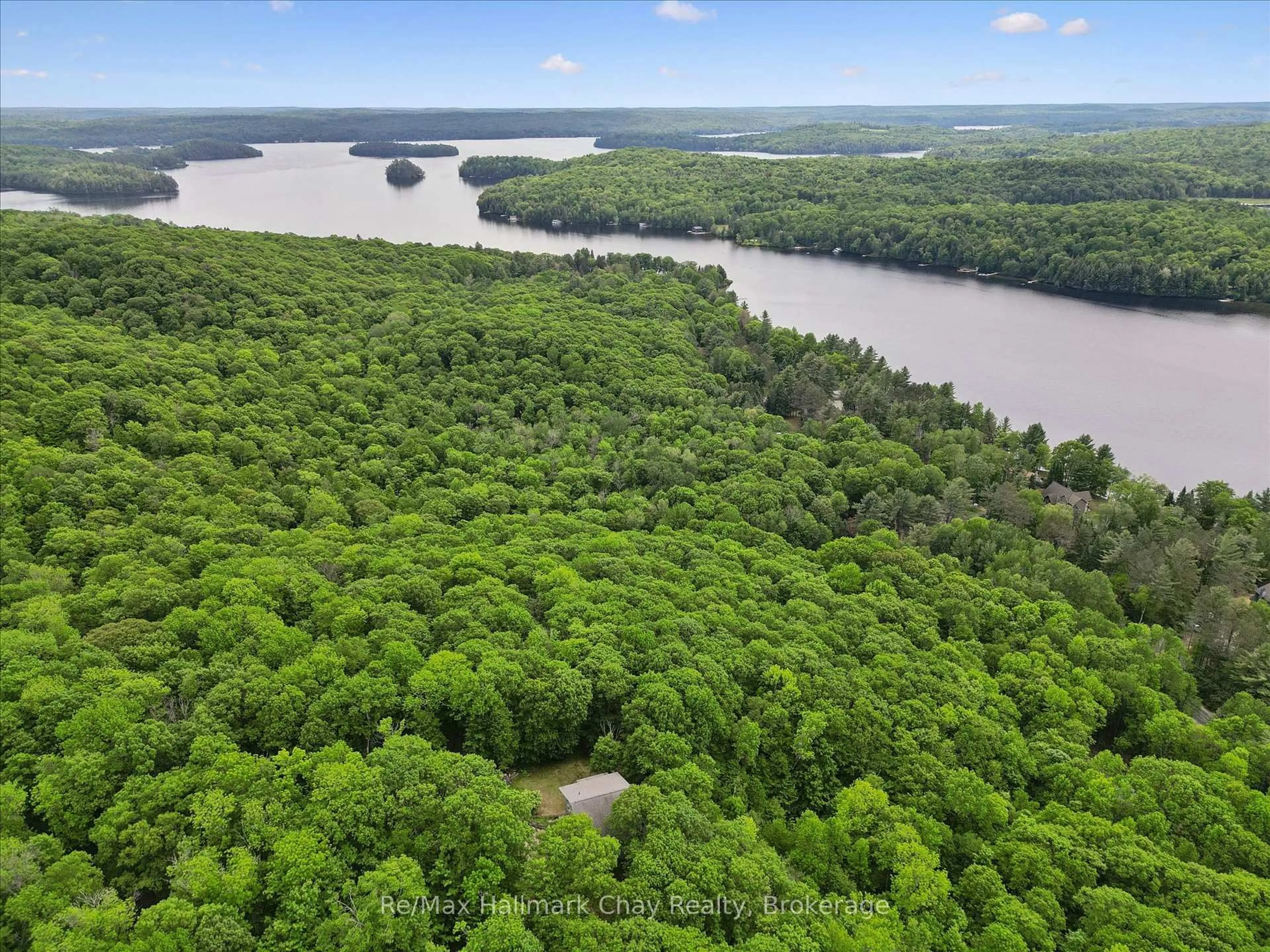 A pic from outside/outdoor area/front of a property/back of a property/a pic from drone, water/lake/river/ocean view for 1497 Fox Point Rd, Lake of Bays Ontario P0A 1H0