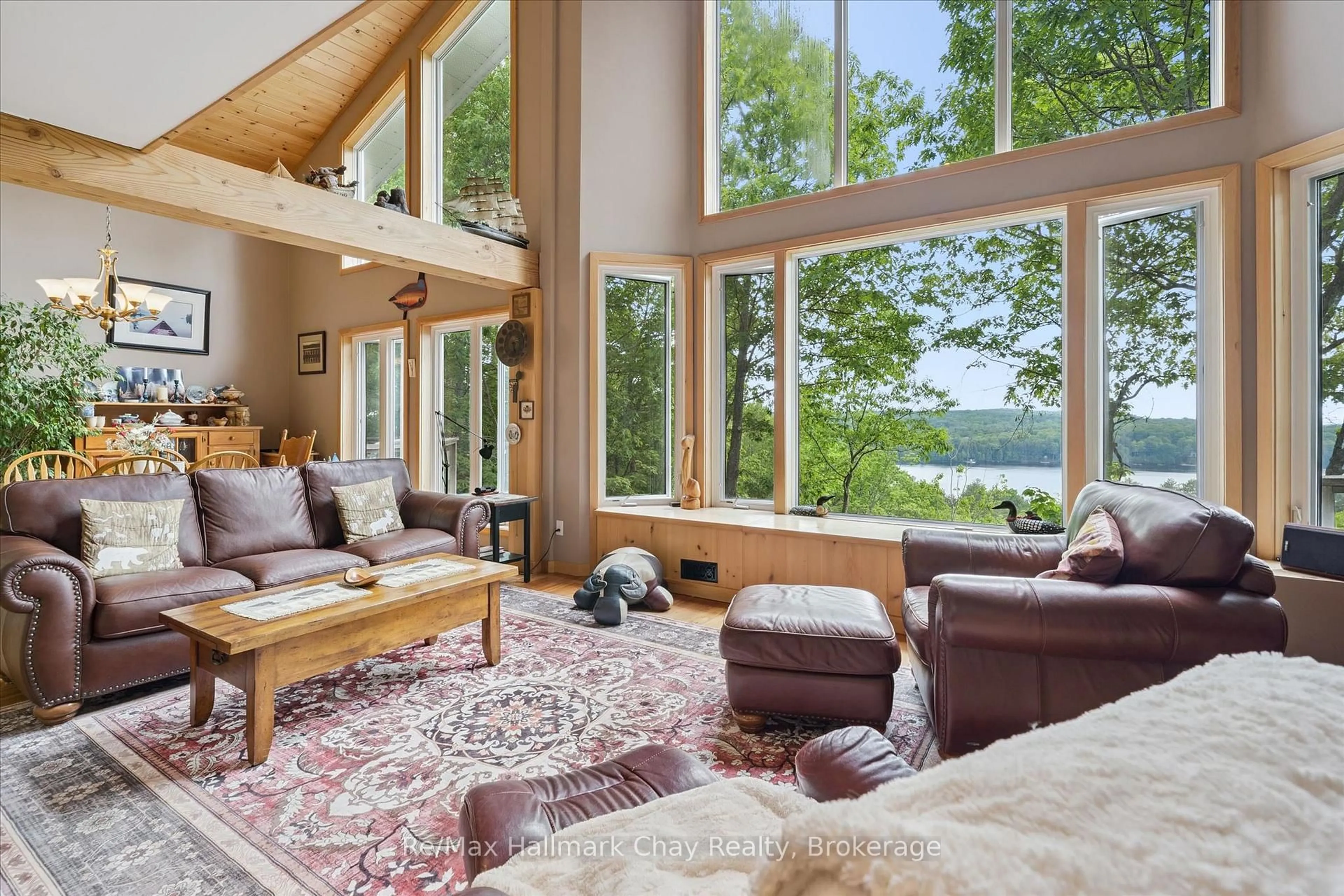 Living room with furniture, unknown for 1497 Fox Point Rd, Lake of Bays Ontario P0A 1H0